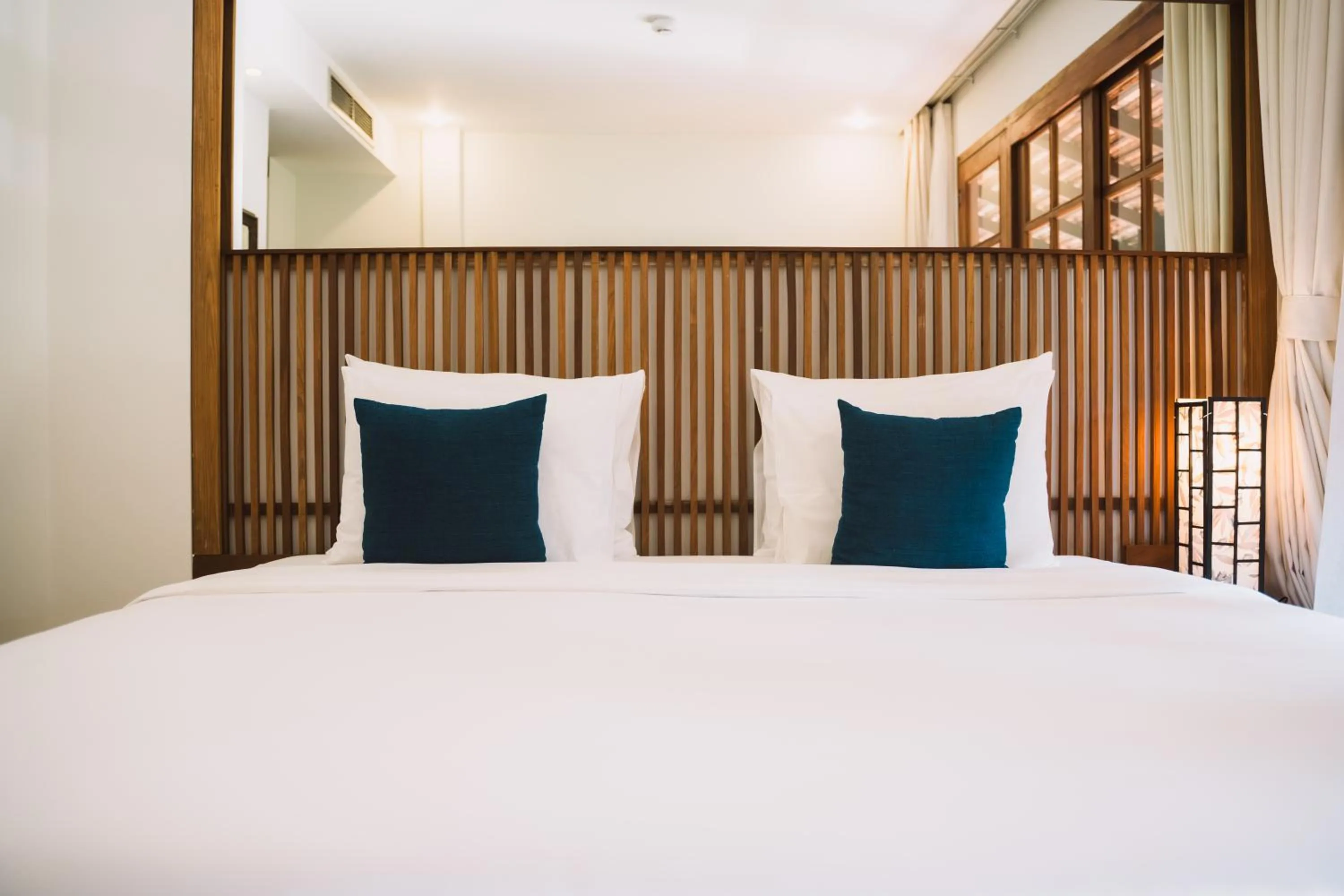 Bed in Le Sen Boutique Hotel