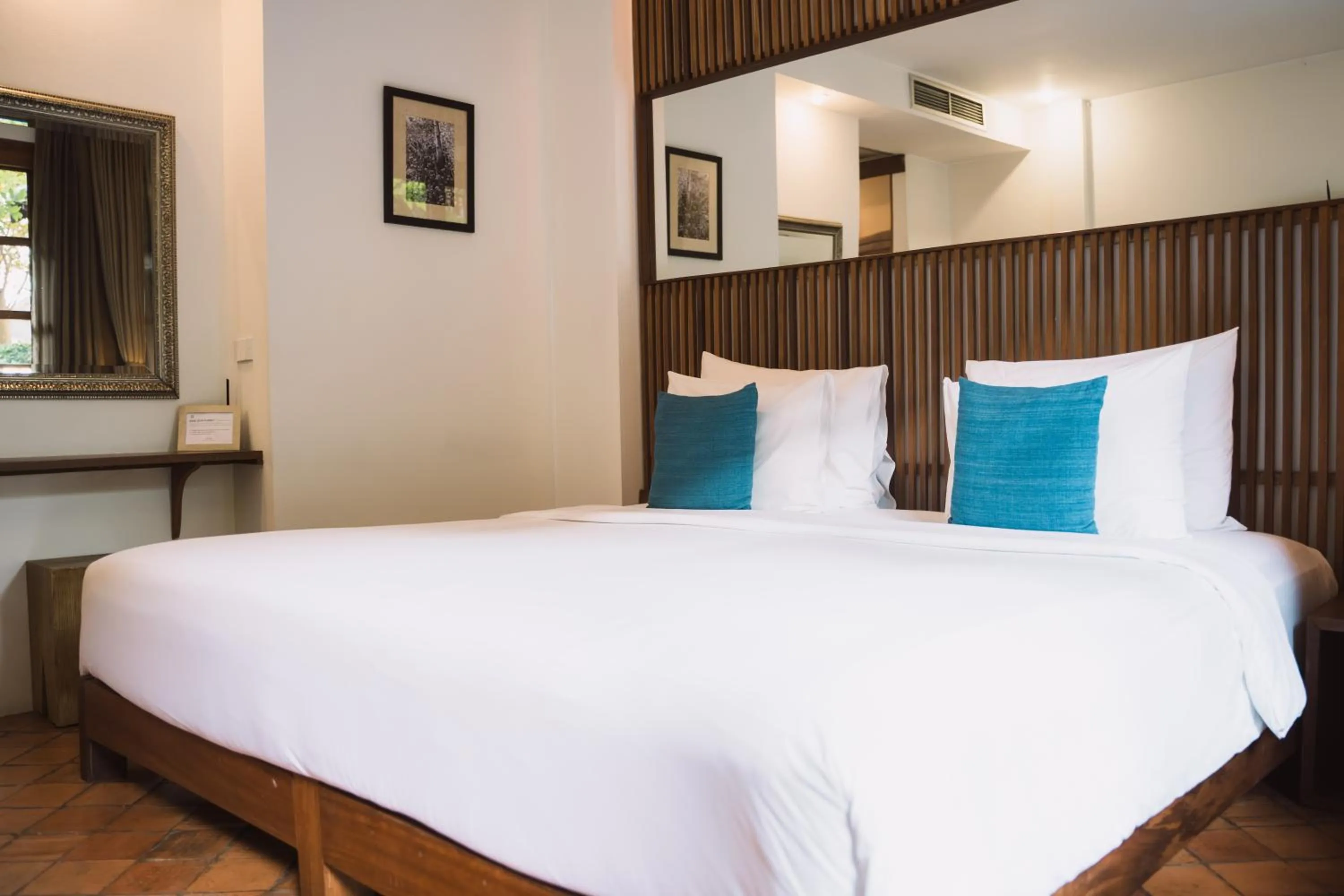 Bed in Le Sen Boutique Hotel