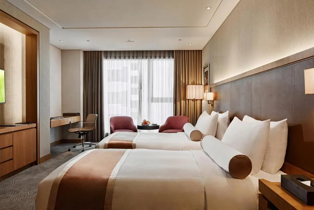 Photo of the whole room, Bed in Millennium Hotel Taichung