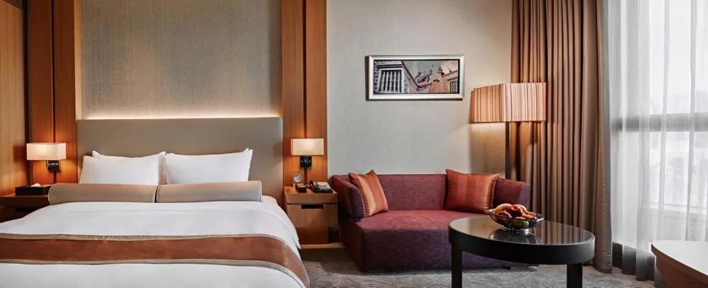 Photo of the whole room, Bed in Millennium Hotel Taichung