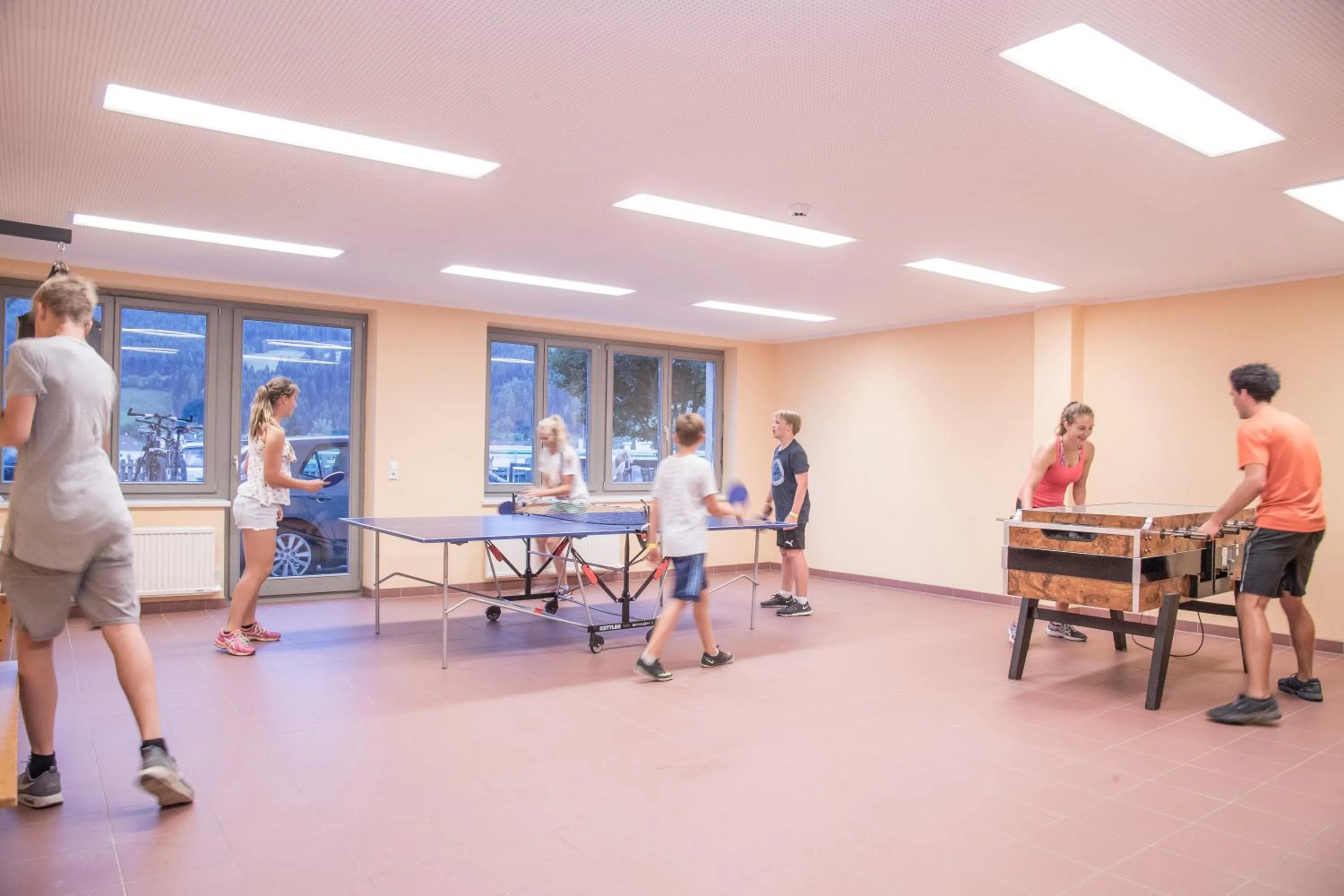 Communal lounge/ TV room in JUFA Hotel St Michael im Lungau