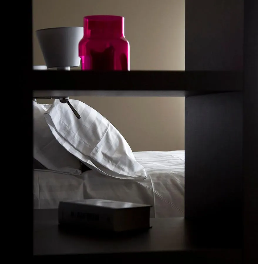 Decorative detail, Bed in Zara Rooms & Suites