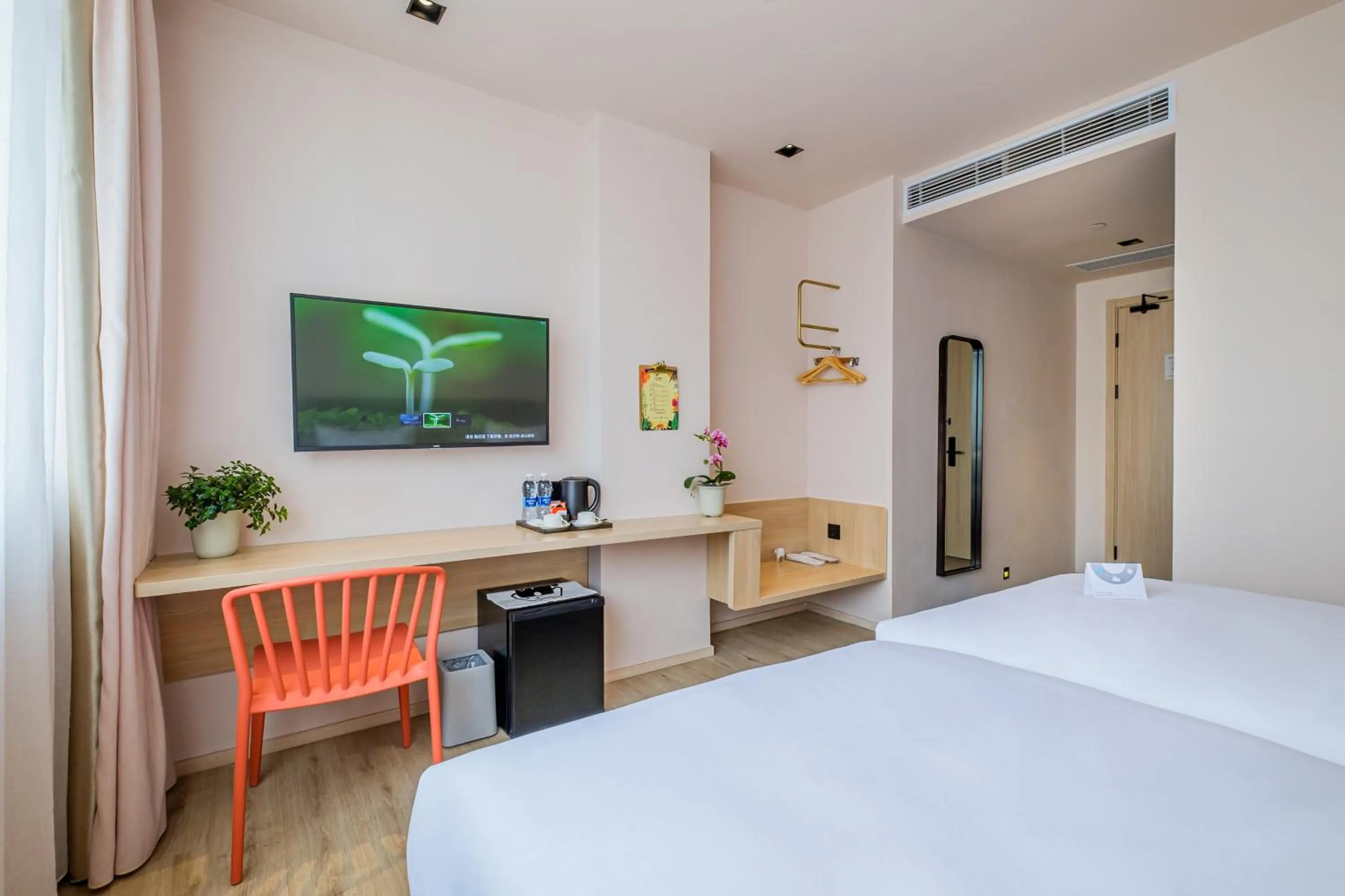 Bed in PACE HOTEL Suzhou Guanqian Branch