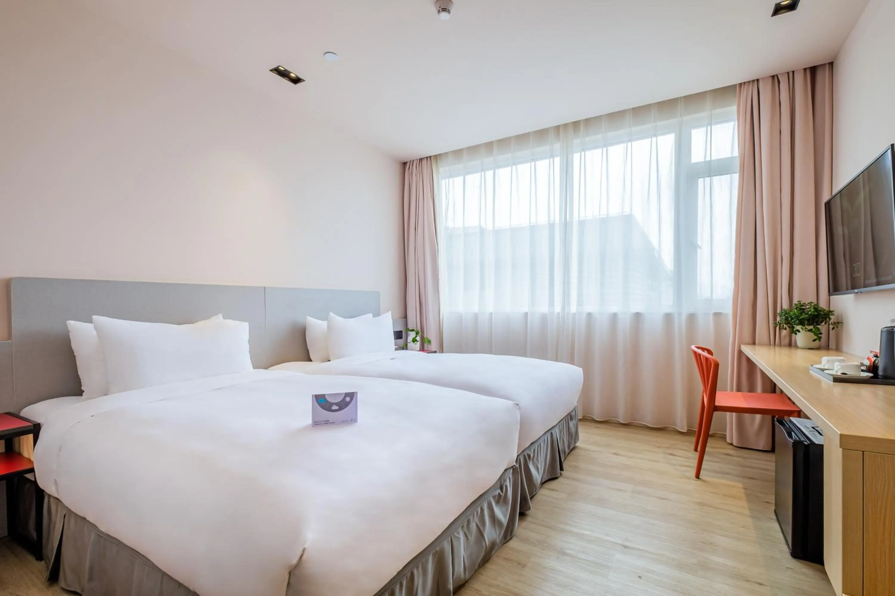 Bed in PACE HOTEL Suzhou Guanqian Branch