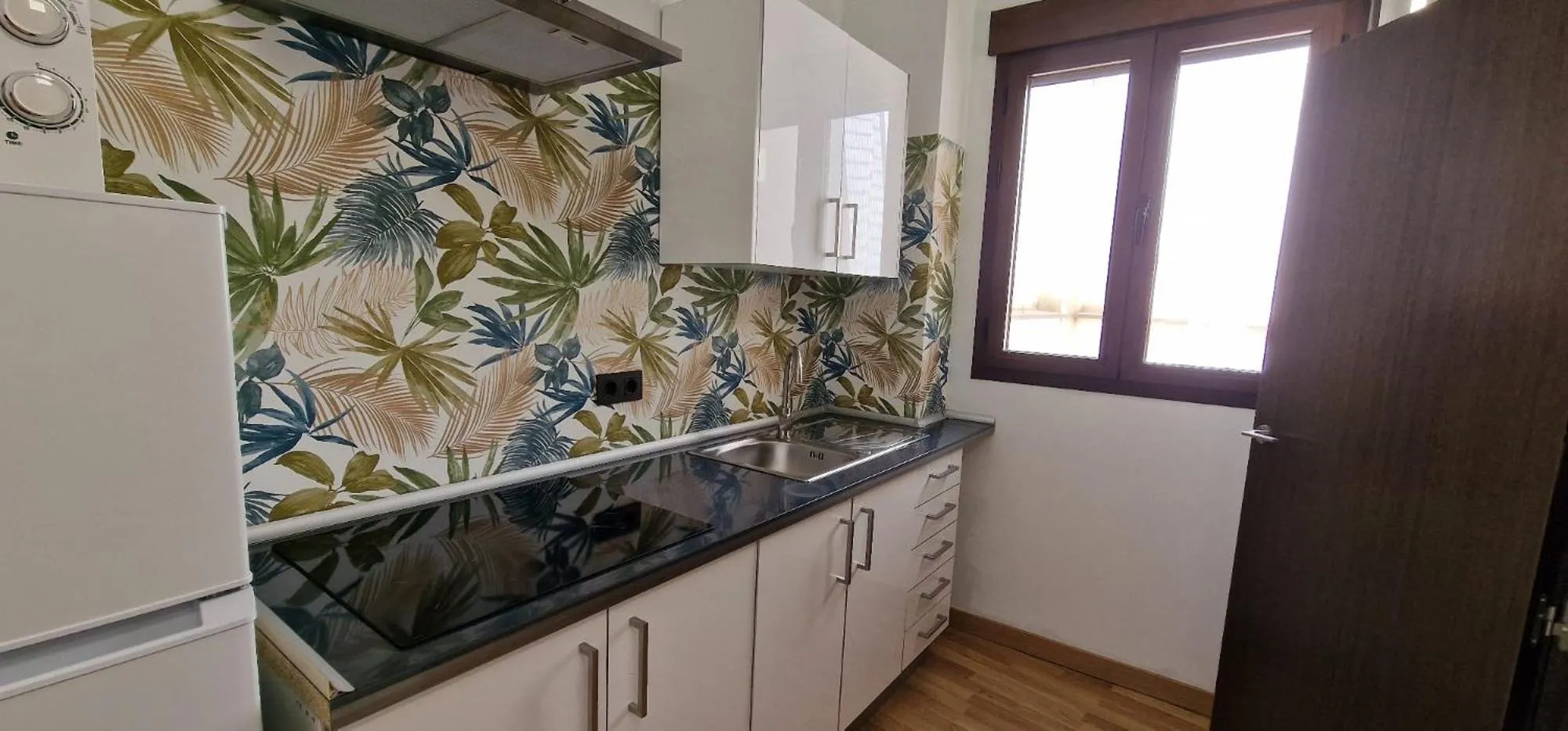 Kitchen or kitchenette in Imeda Apartamentos Escudo del Carmen 19