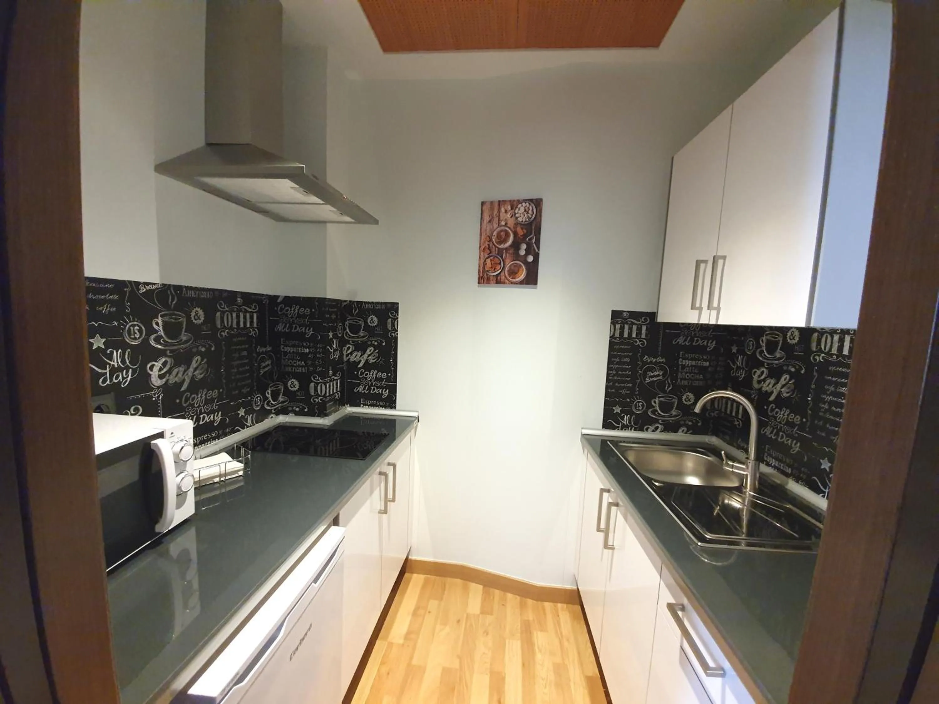 Kitchen or kitchenette in Imeda Apartamentos Escudo del Carmen 19
