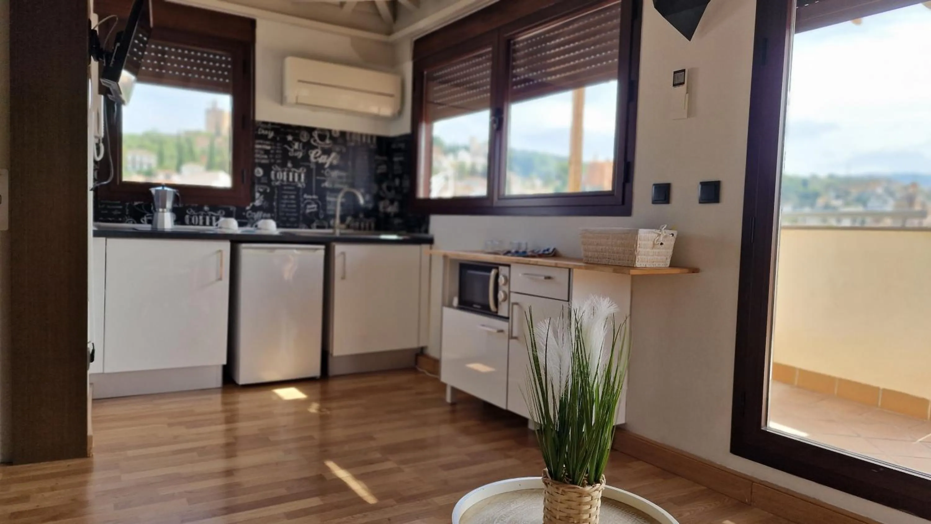 Kitchen or kitchenette in Imeda Apartamentos Escudo del Carmen 19