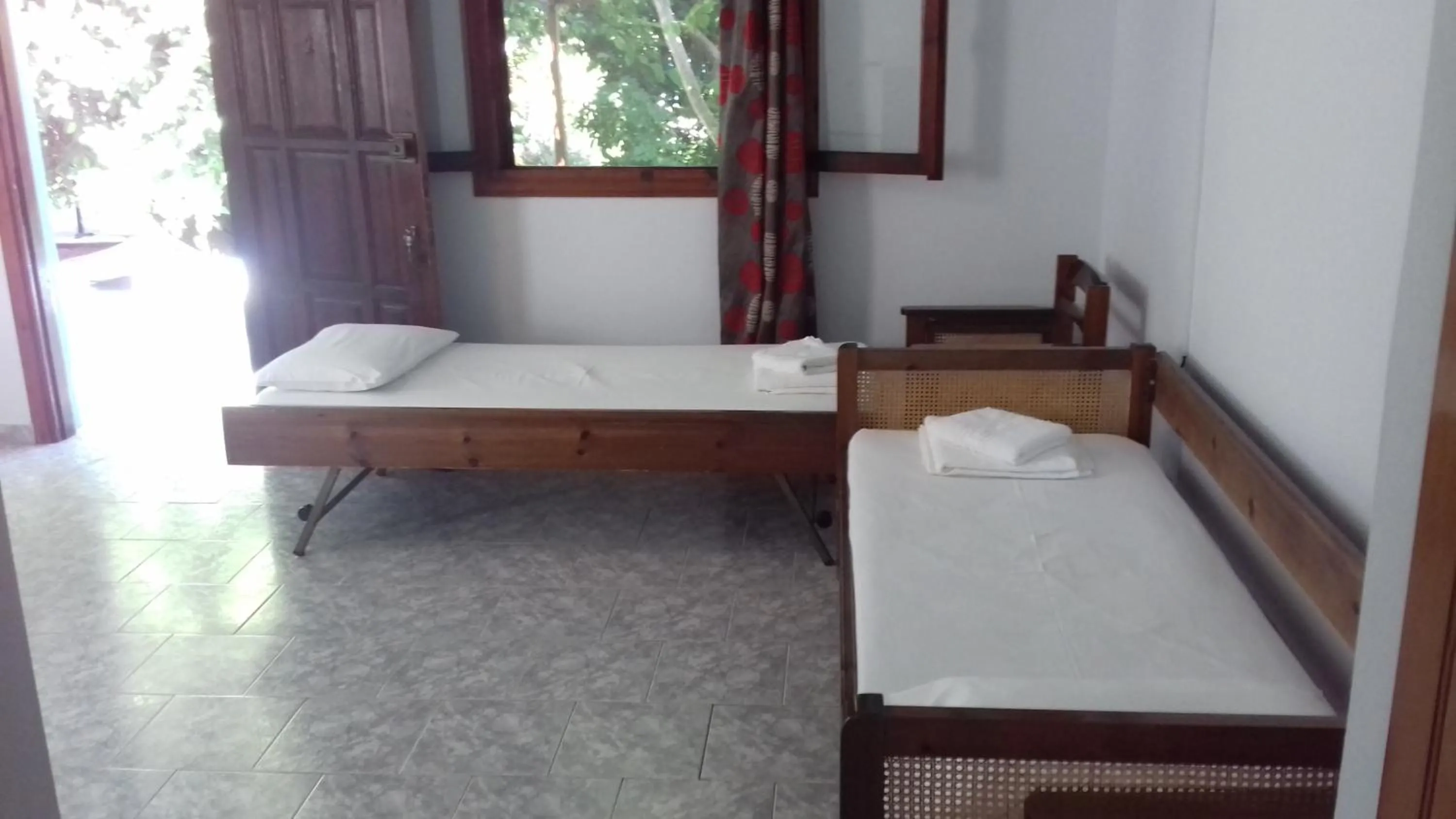 Bed in Saint Nicolas Bungalows
