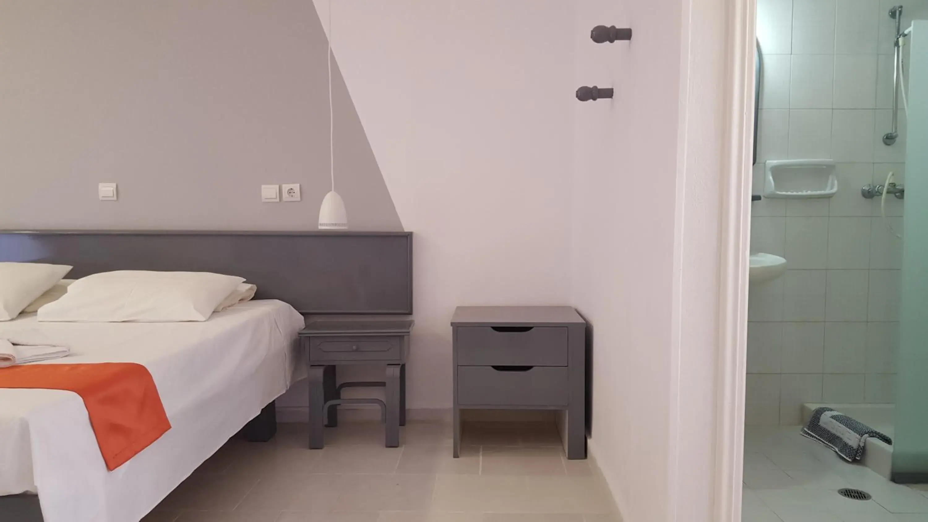 Bed in Oleander Studios Bed in Oleander Studios