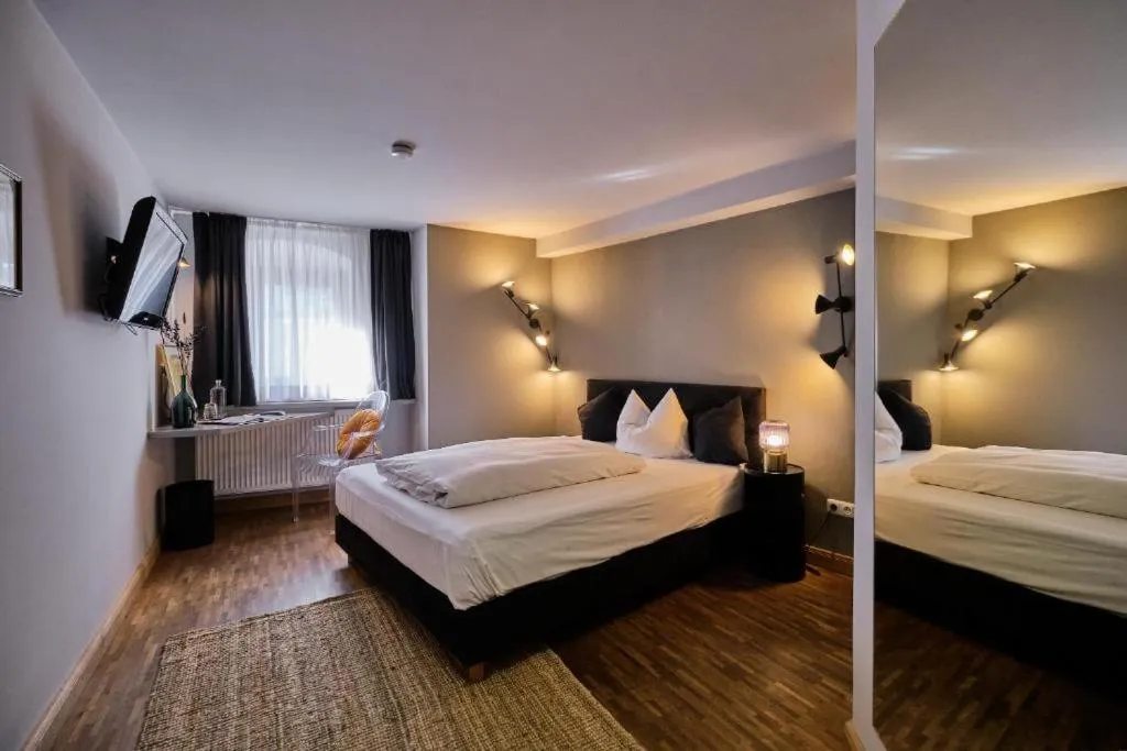 Photo of the whole room, Bed in Hotel Roter Hahn