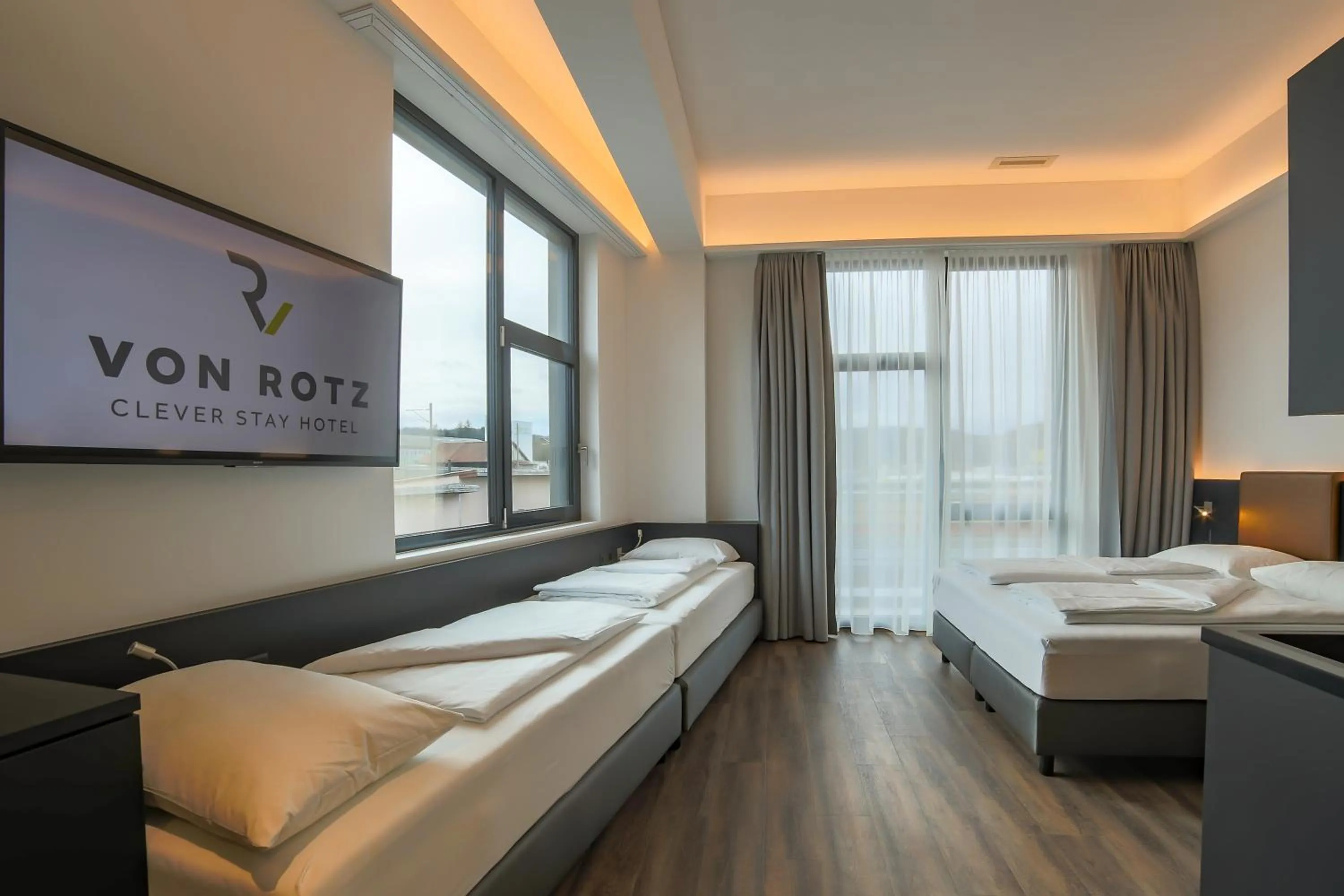 Bed in Self Check-in Hotel von Rotz