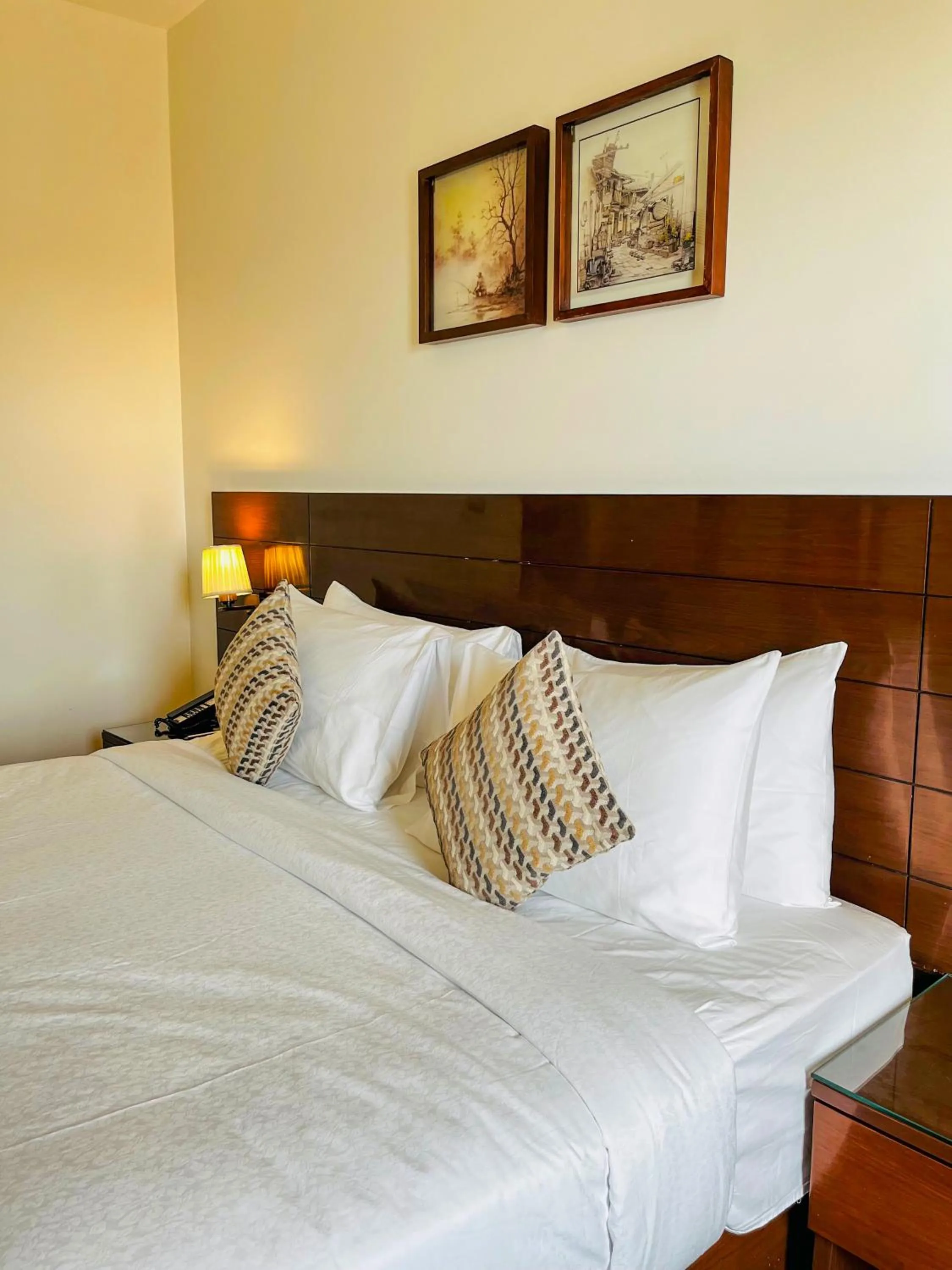 Bed in Hotel Home In By Amrik Sukhdev