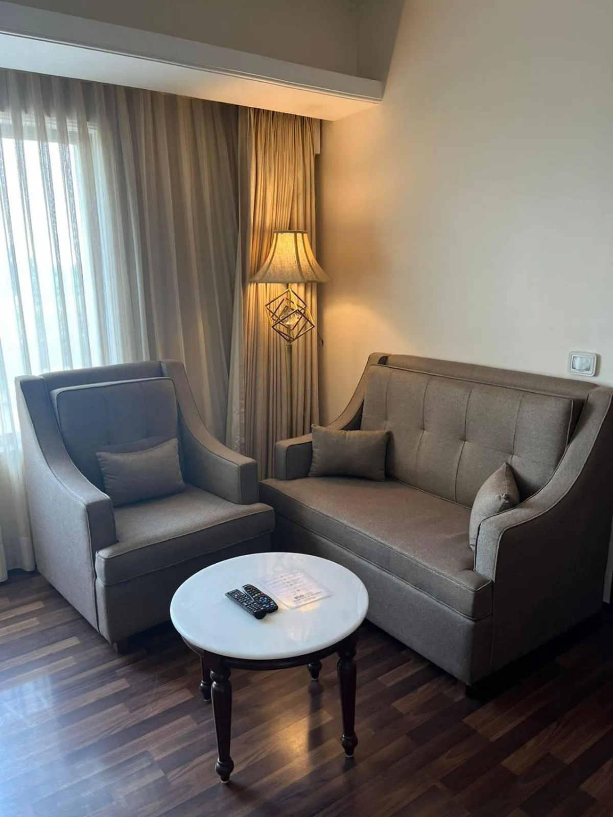 Living room in Hotel Home In By Amrik Sukhdev