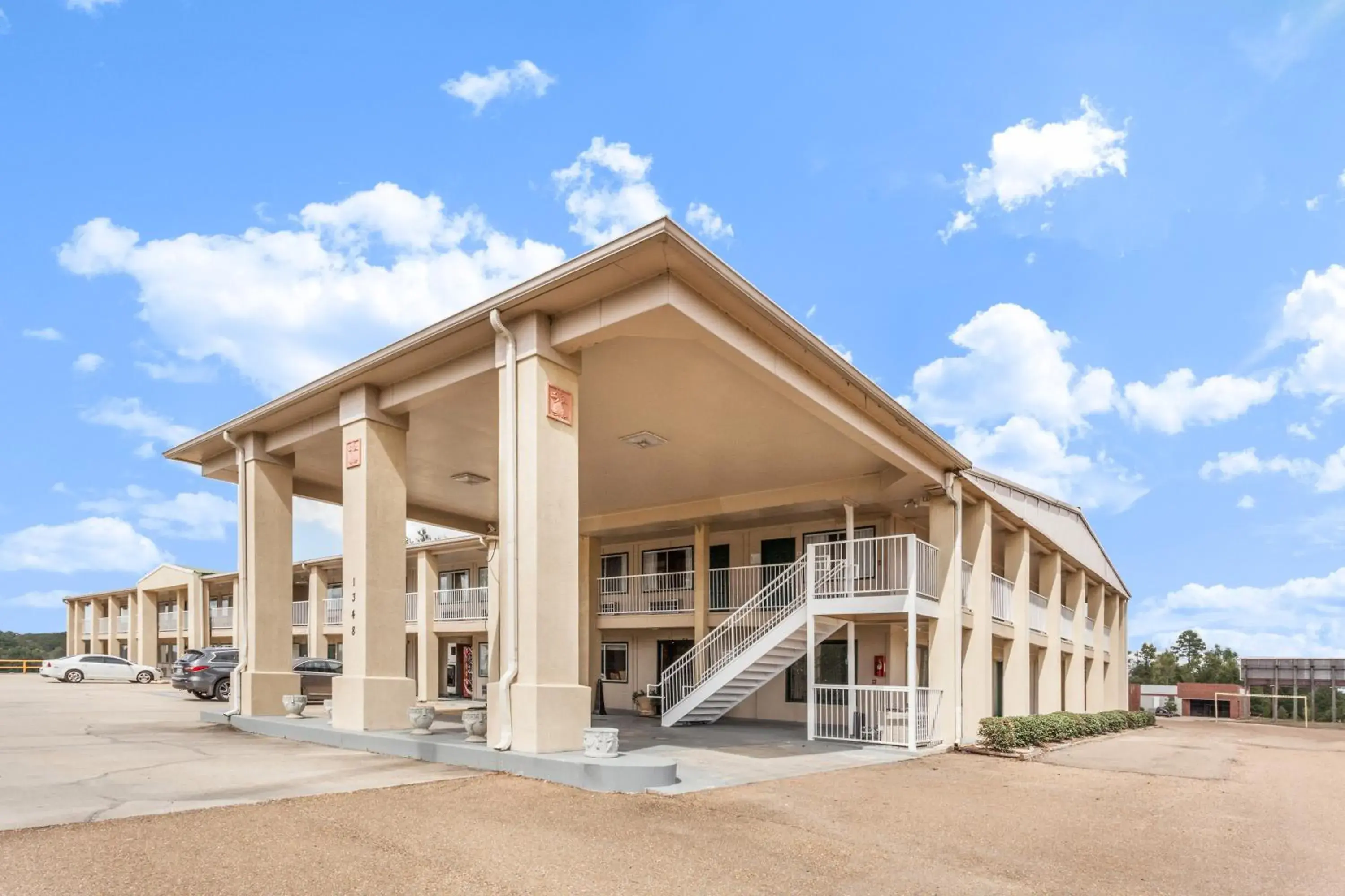 Property building in Super 8 by Wyndham Brookhaven Property building in Super 8 by Wyndham Brookhaven