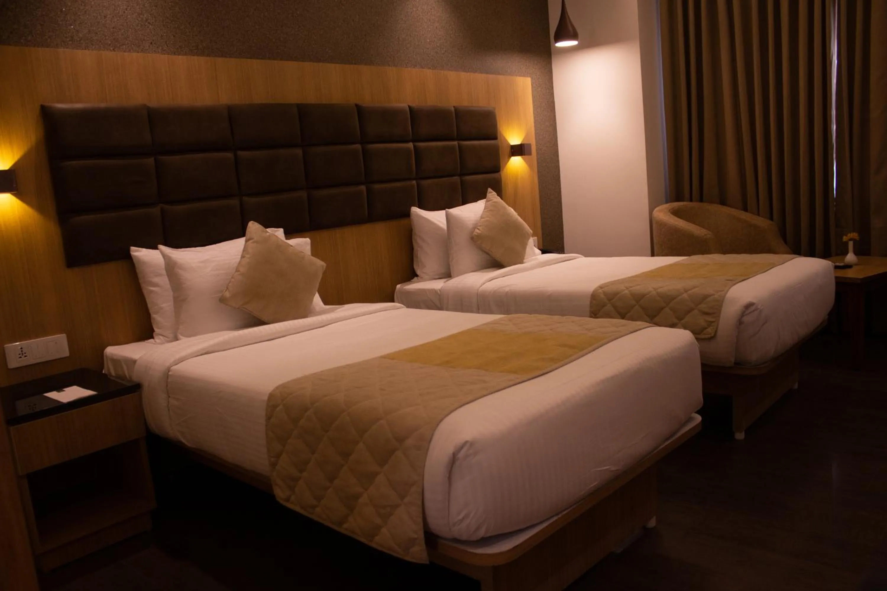 Bed in Shivas Galaxy Hotel