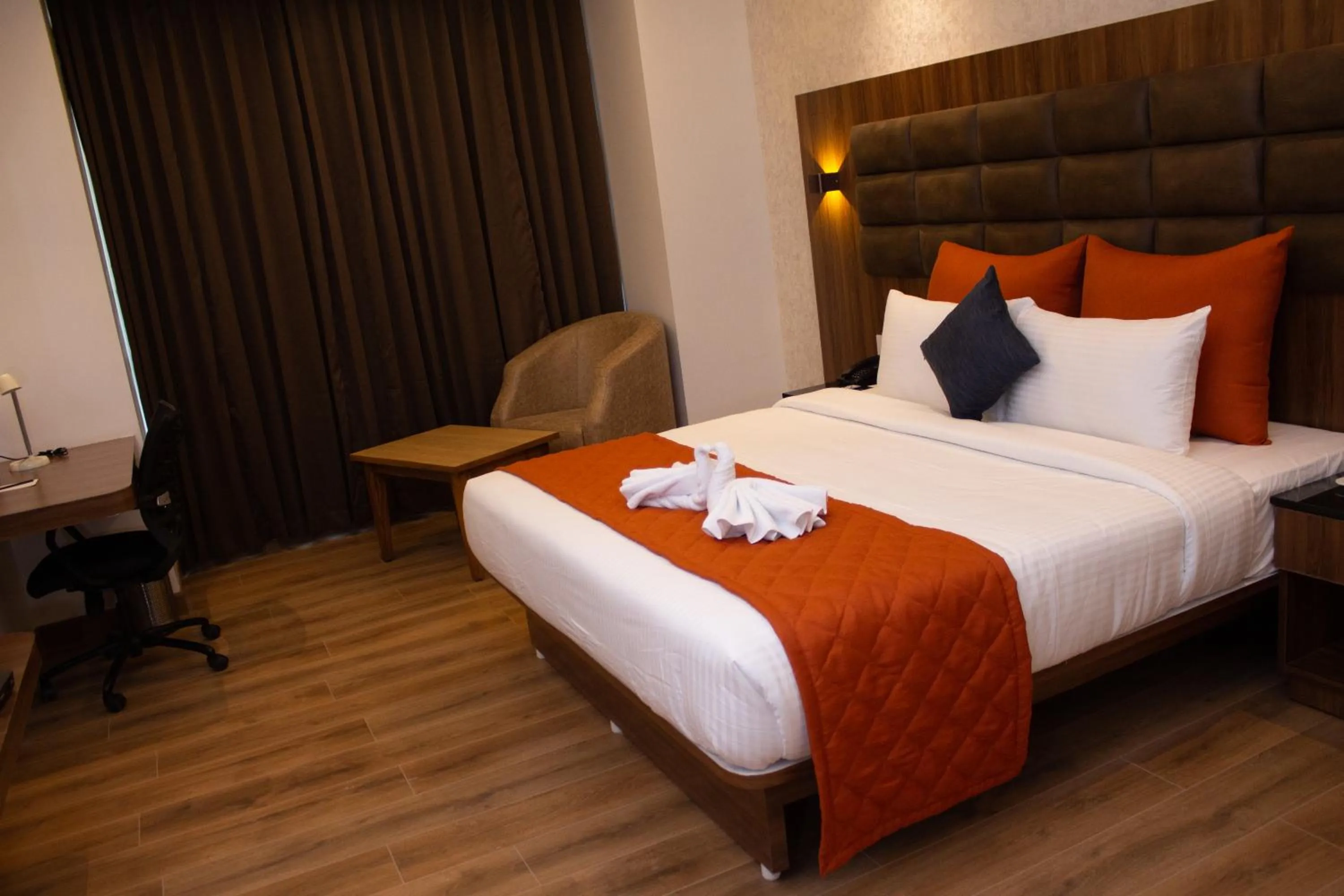 Bed in Shivas Galaxy Hotel