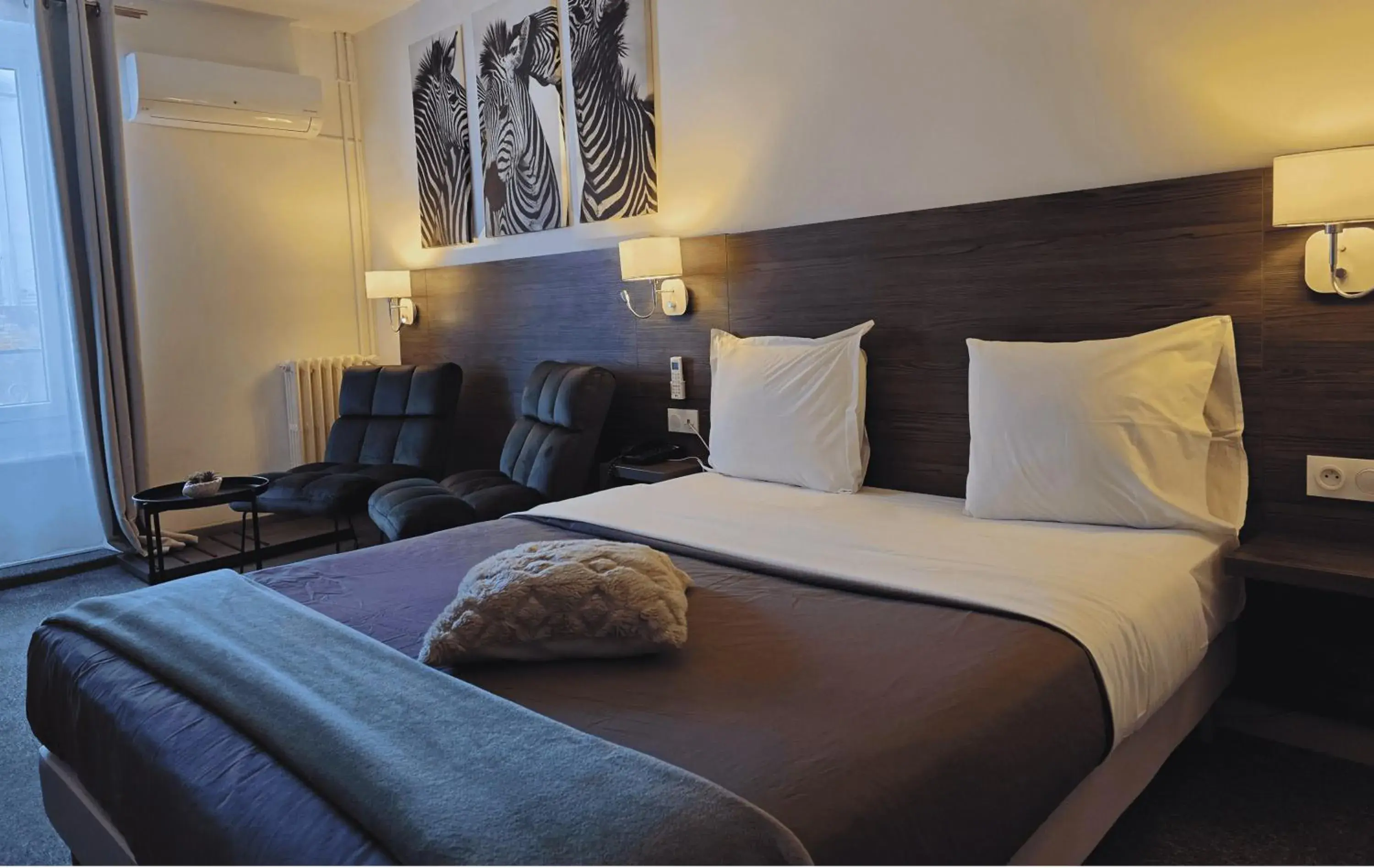 Budget Double Room in Hôtel L'Alsace Budget Double Room in Hôtel L'Alsace