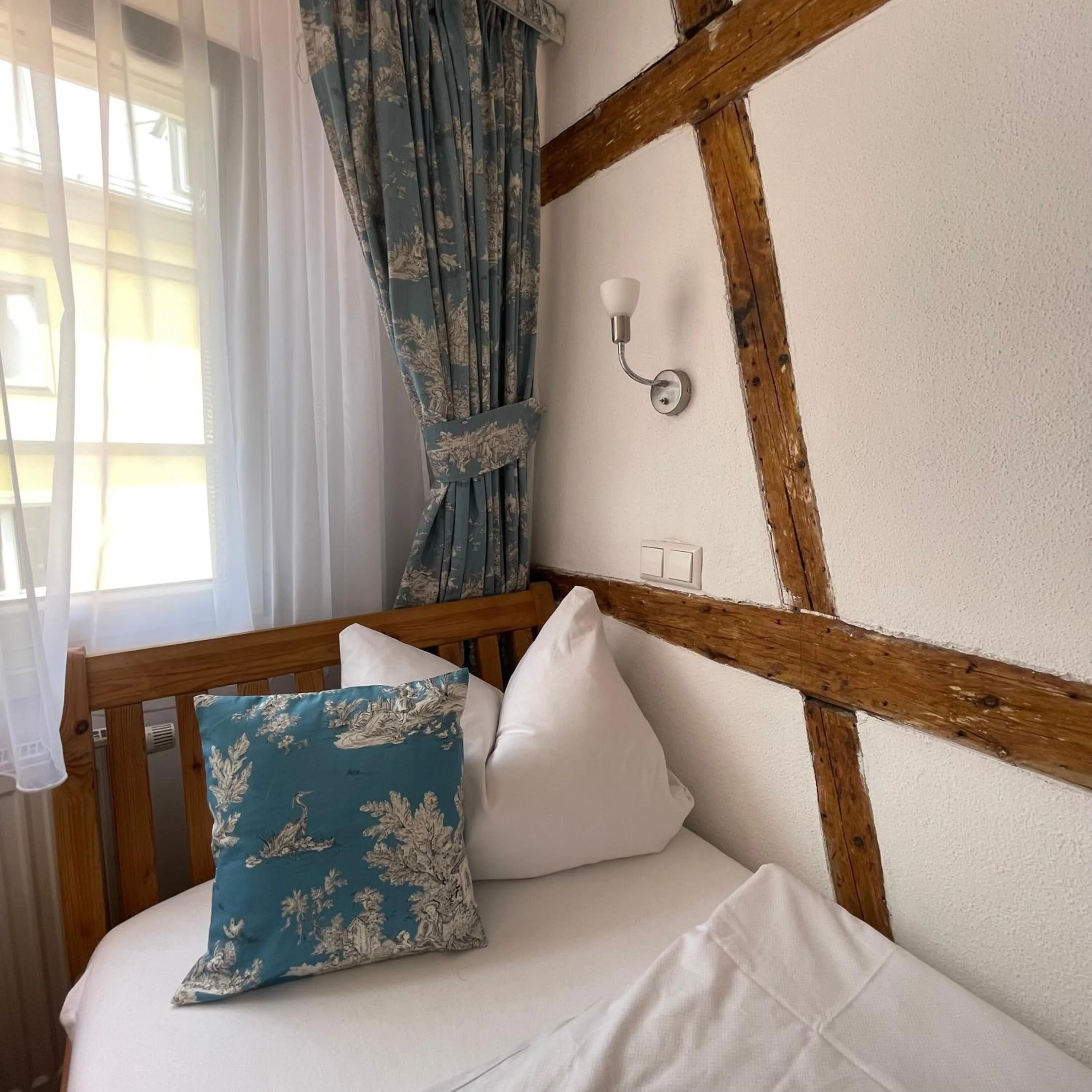 Bed in Hotel Gasthof Inselgraben garni