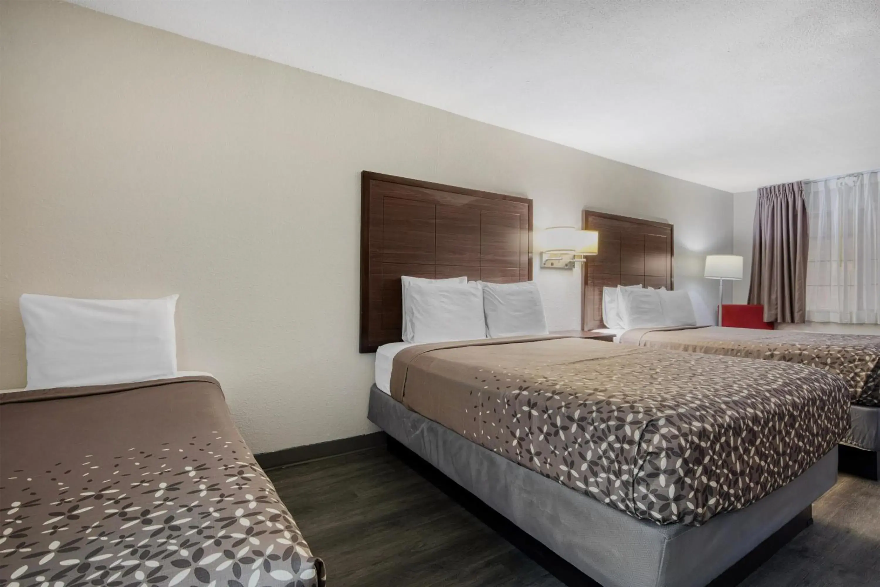 Queen and Double Room with Two Queen Beds and One Double Bed - Non-Smoking in SureStay Hotel by Best Western Terrell Queen and Double Room with Two Queen Beds and One Double Bed - Non-Smoking in SureStay Hotel by Best Western Terrell