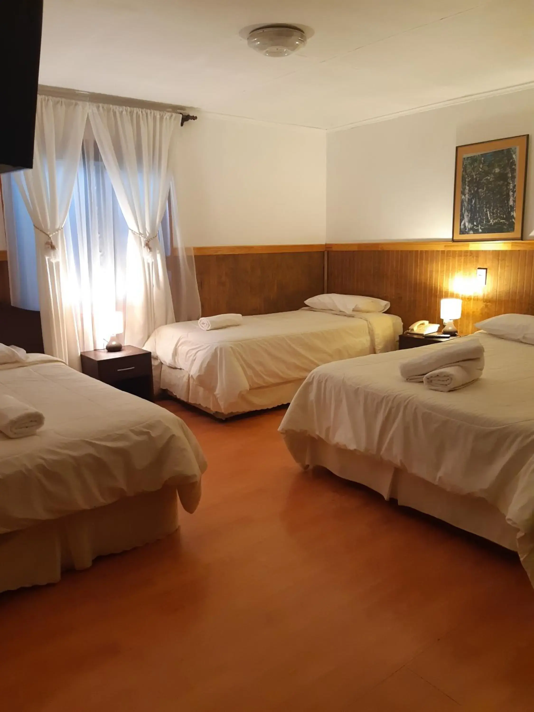 Quadruple Room with Private Bathroom in Agostini Hotel Quadruple Room with Private Bathroom in Agostini Hotel