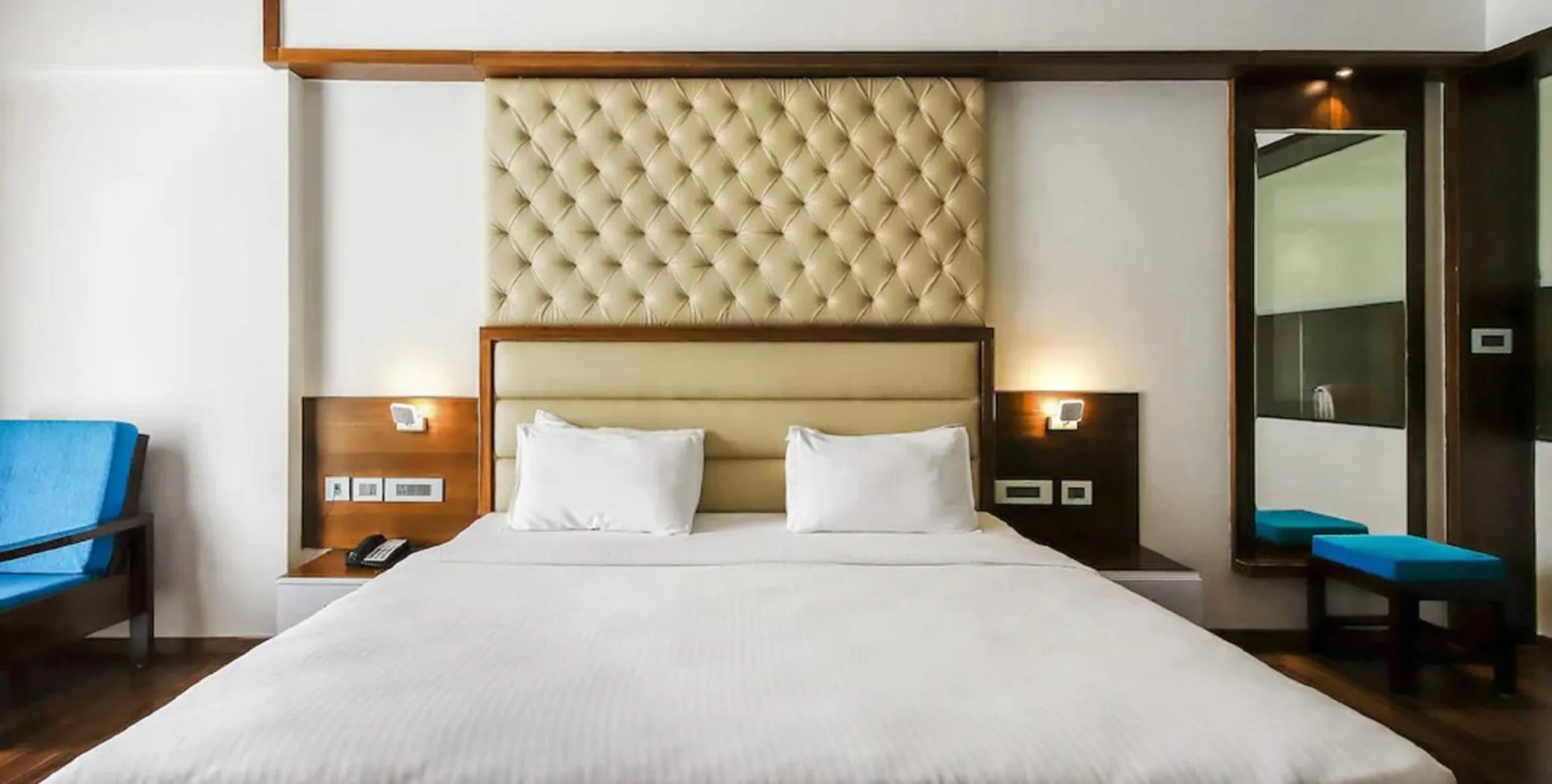 Bed in Hotel Preethi International