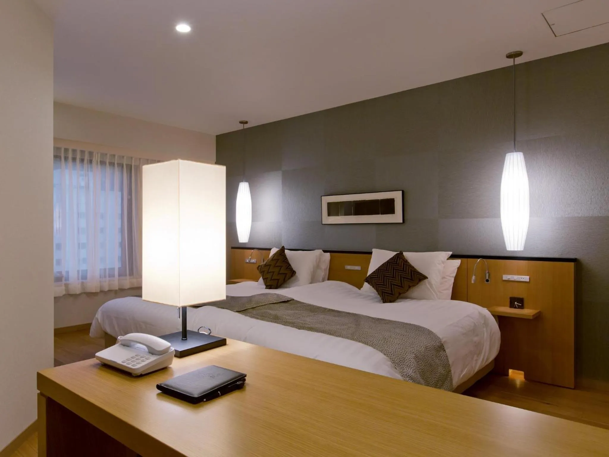 Bed in The Lake View Toya Nonokaze Resort