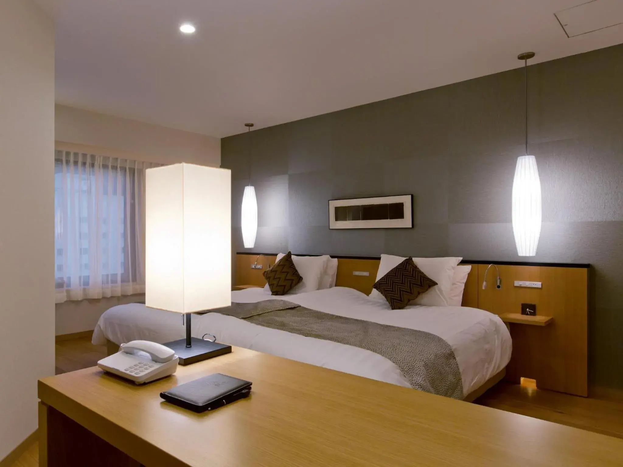 Bed in The Lake View Toya Nonokaze Resort Bed in The Lake View Toya Nonokaze Resort