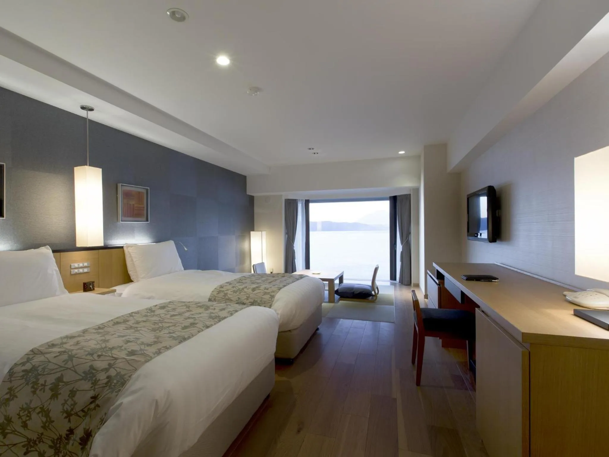 Bed in The Lake View Toya Nonokaze Resort