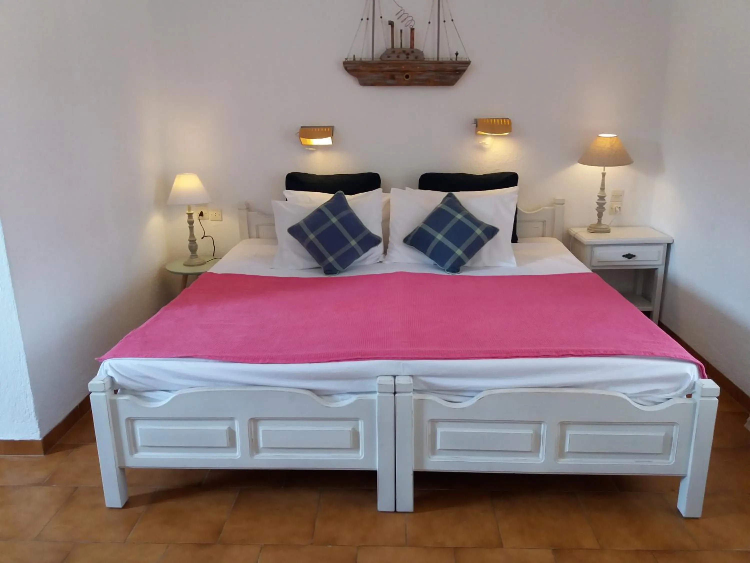 Bed in Anofli Suites
