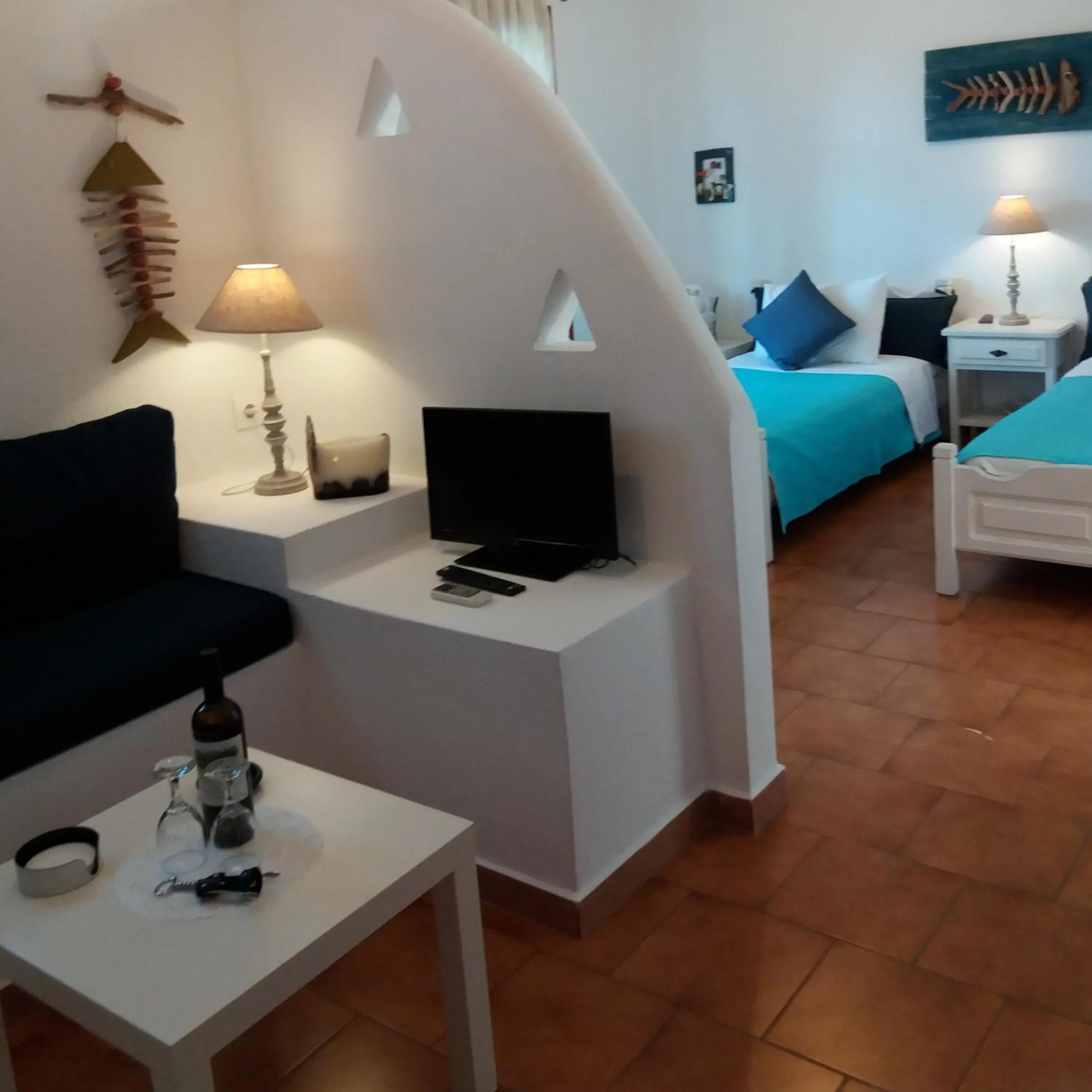 Bed in Anofli Suites