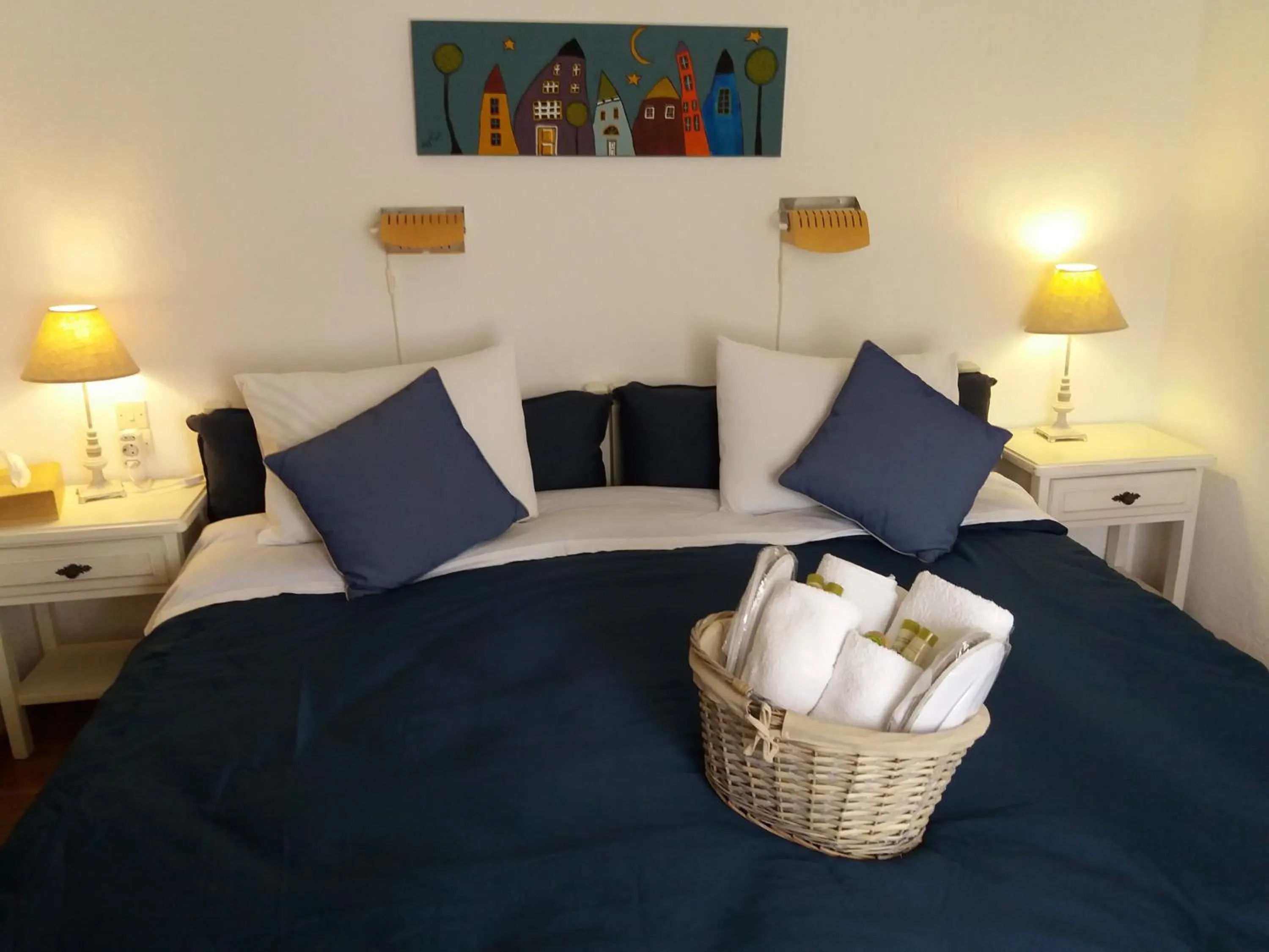 Bed in Anofli Suites