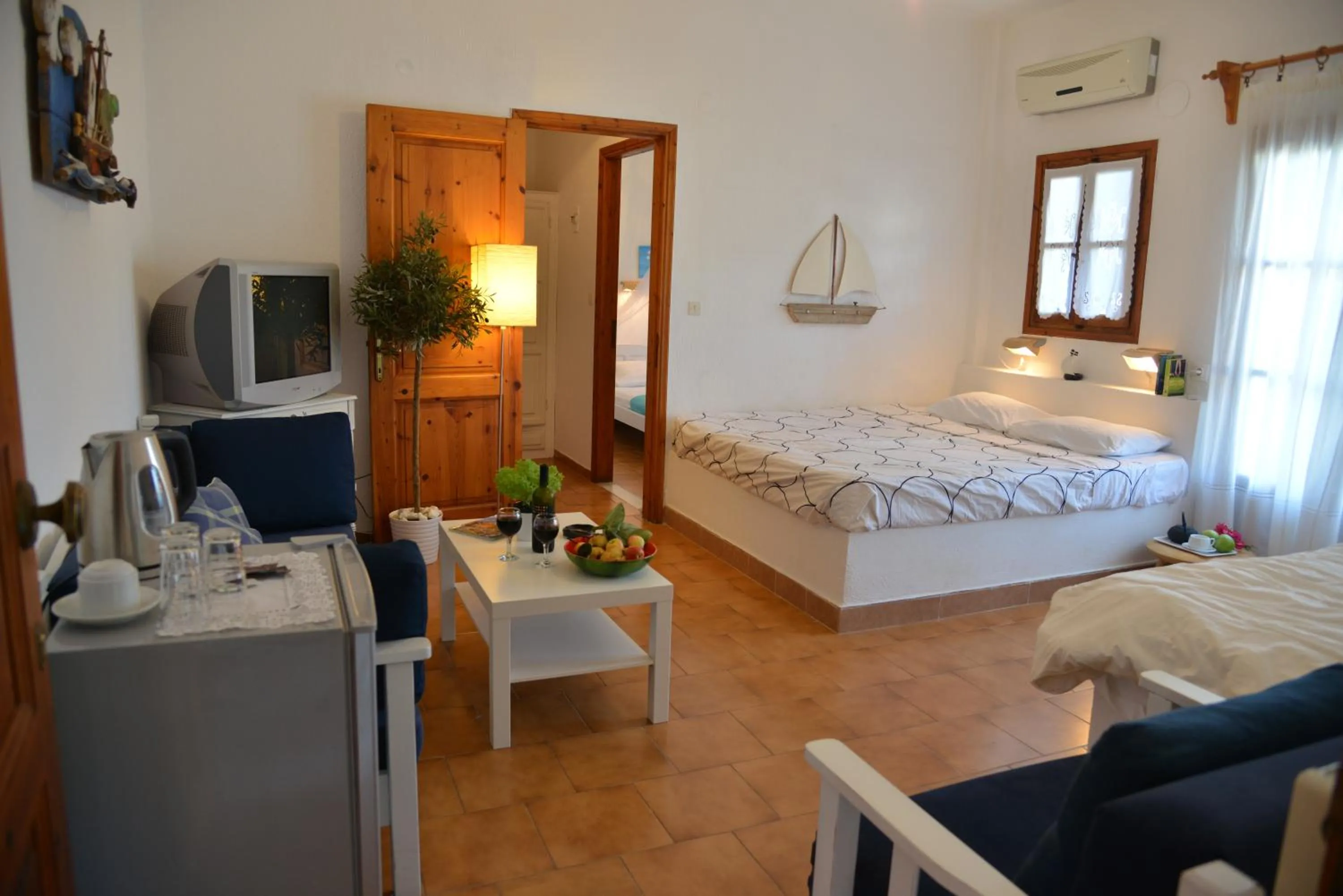 Photo of the whole room, Bed in Anofli Suites