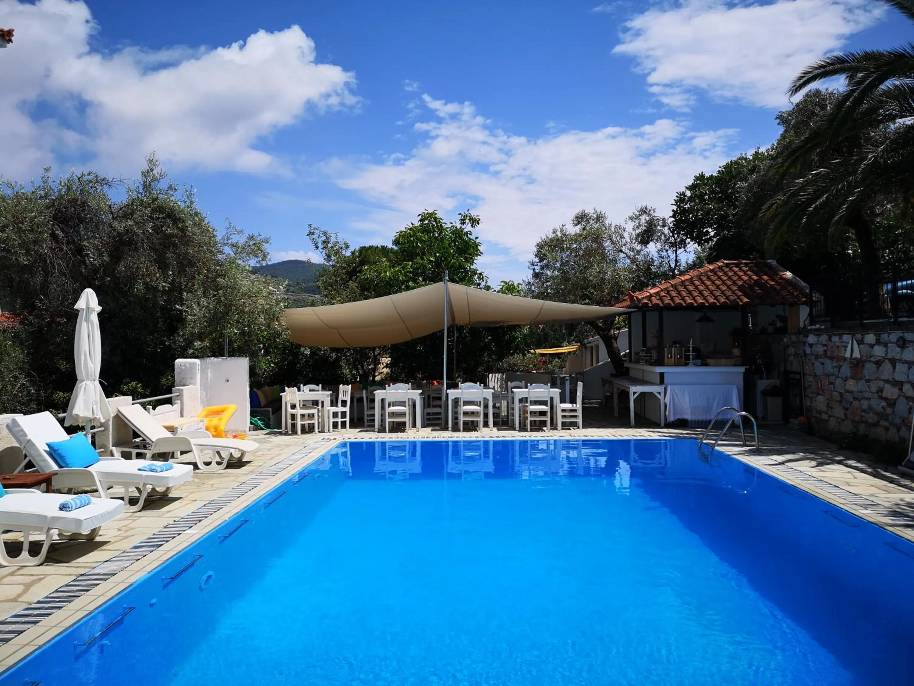 Swimming pool in Anofli Suites