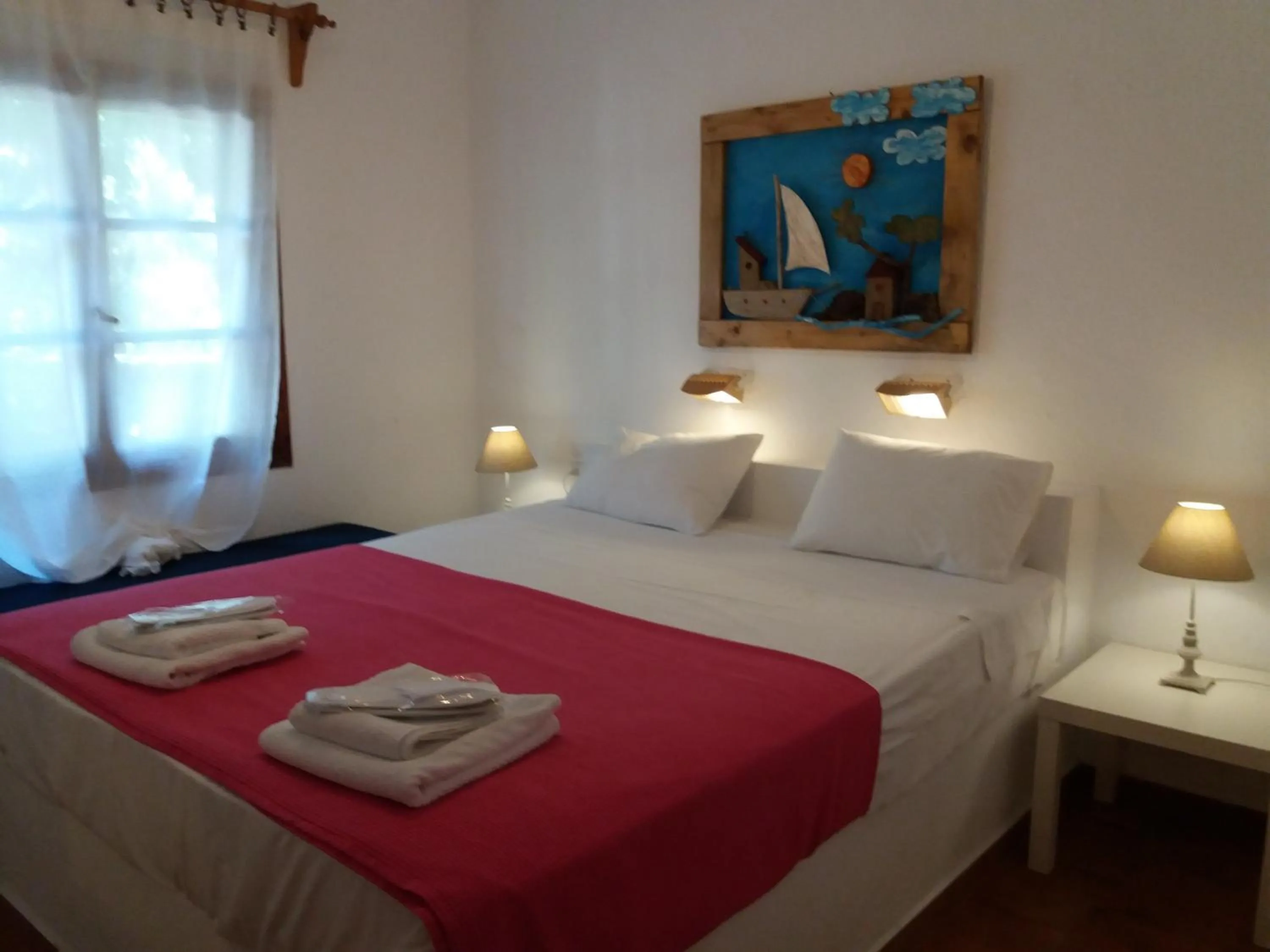 Bed in Anofli Suites