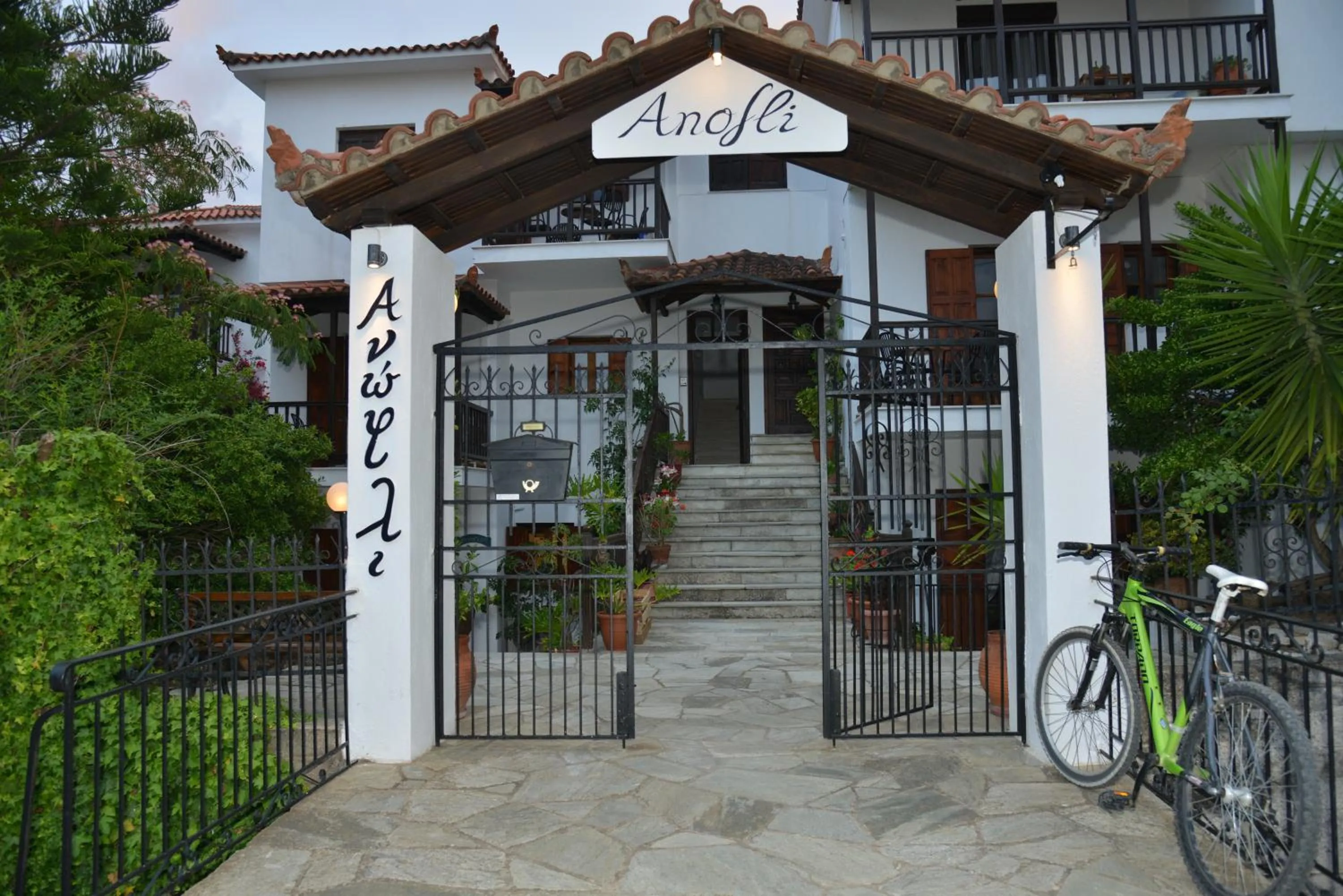 Property logo or sign in Anofli Suites