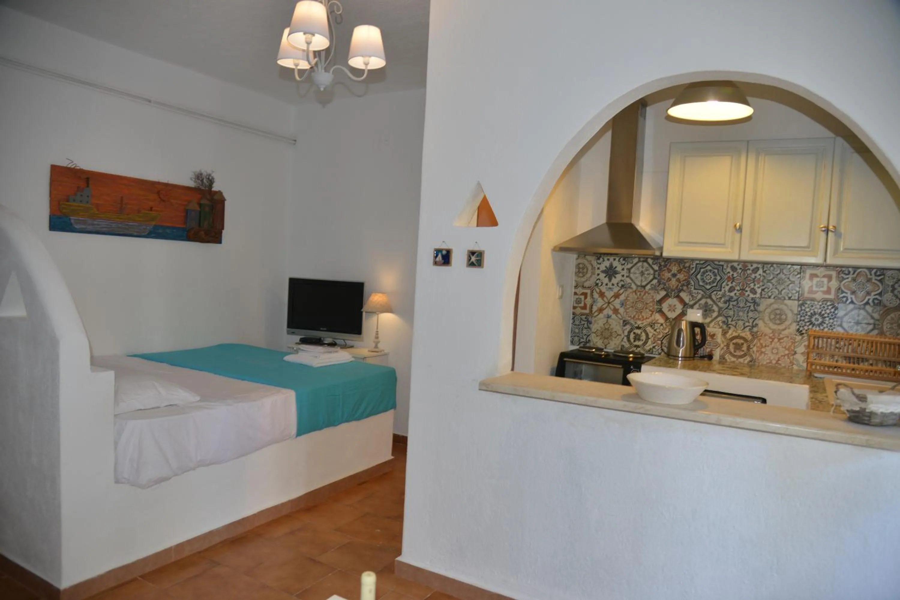 TV and multimedia, Bed in Anofli Suites