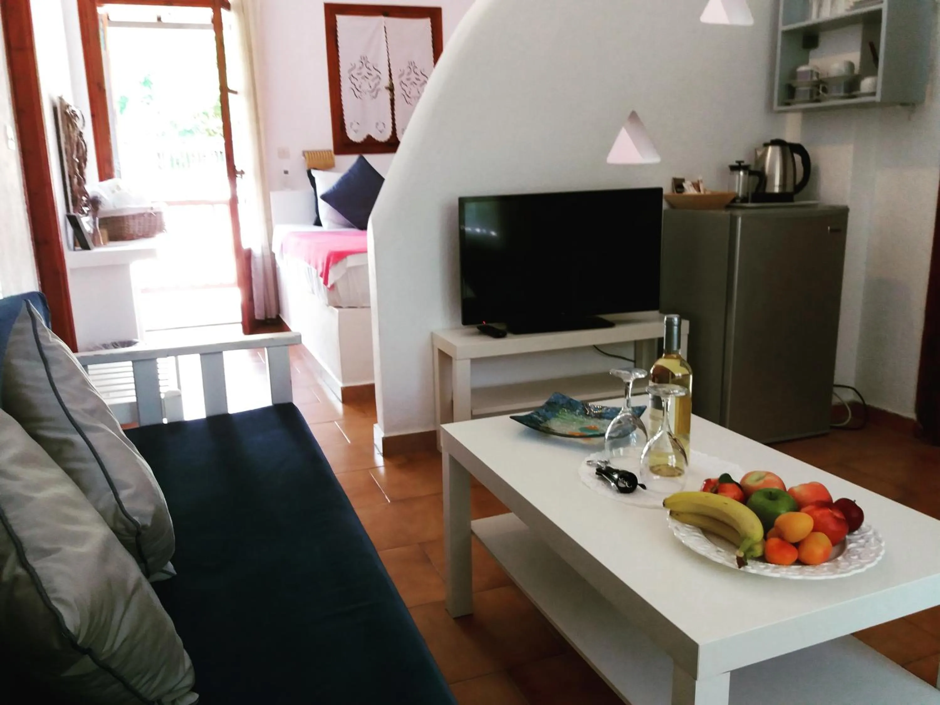 Bed in Anofli Suites