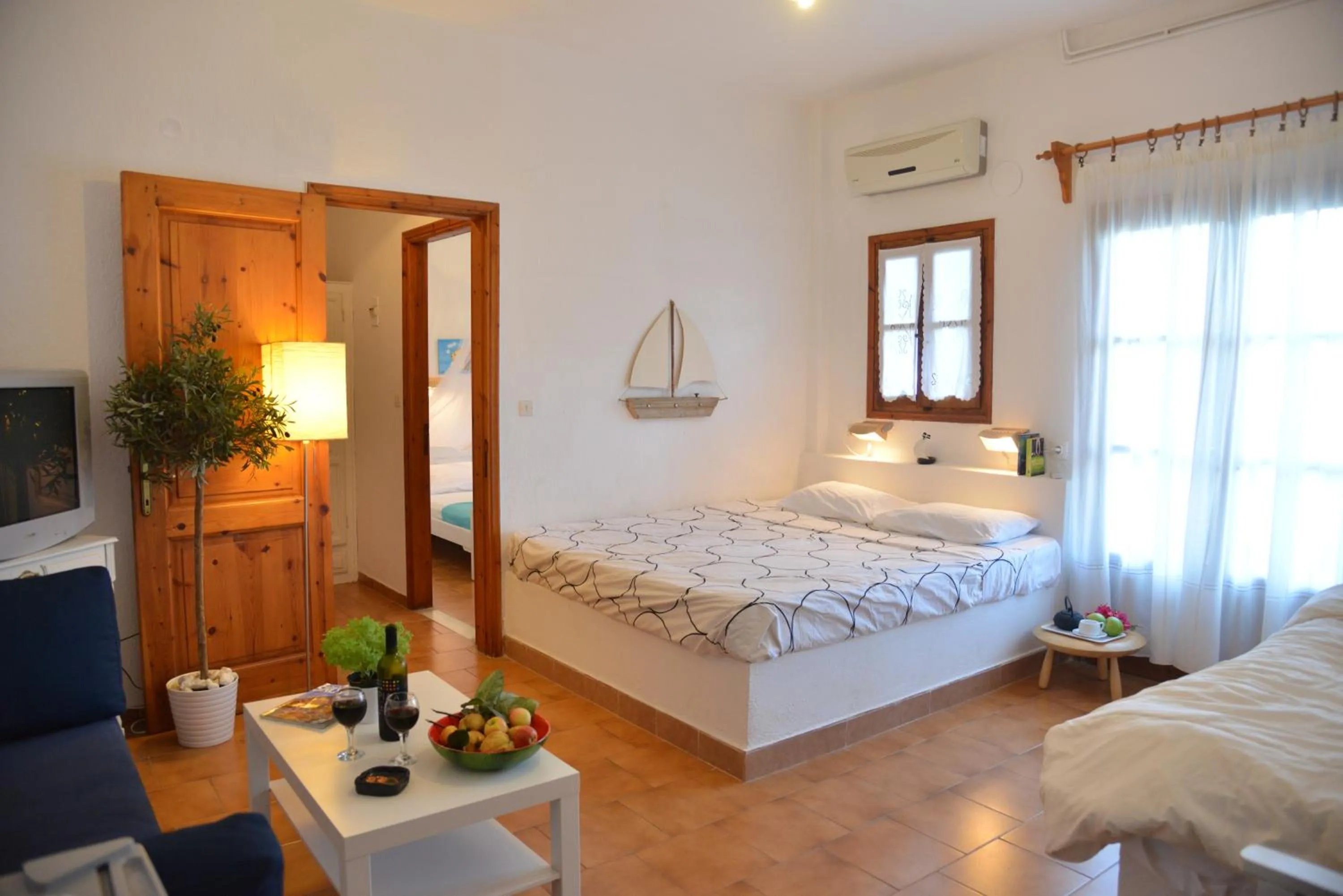 Bed in Anofli Suites