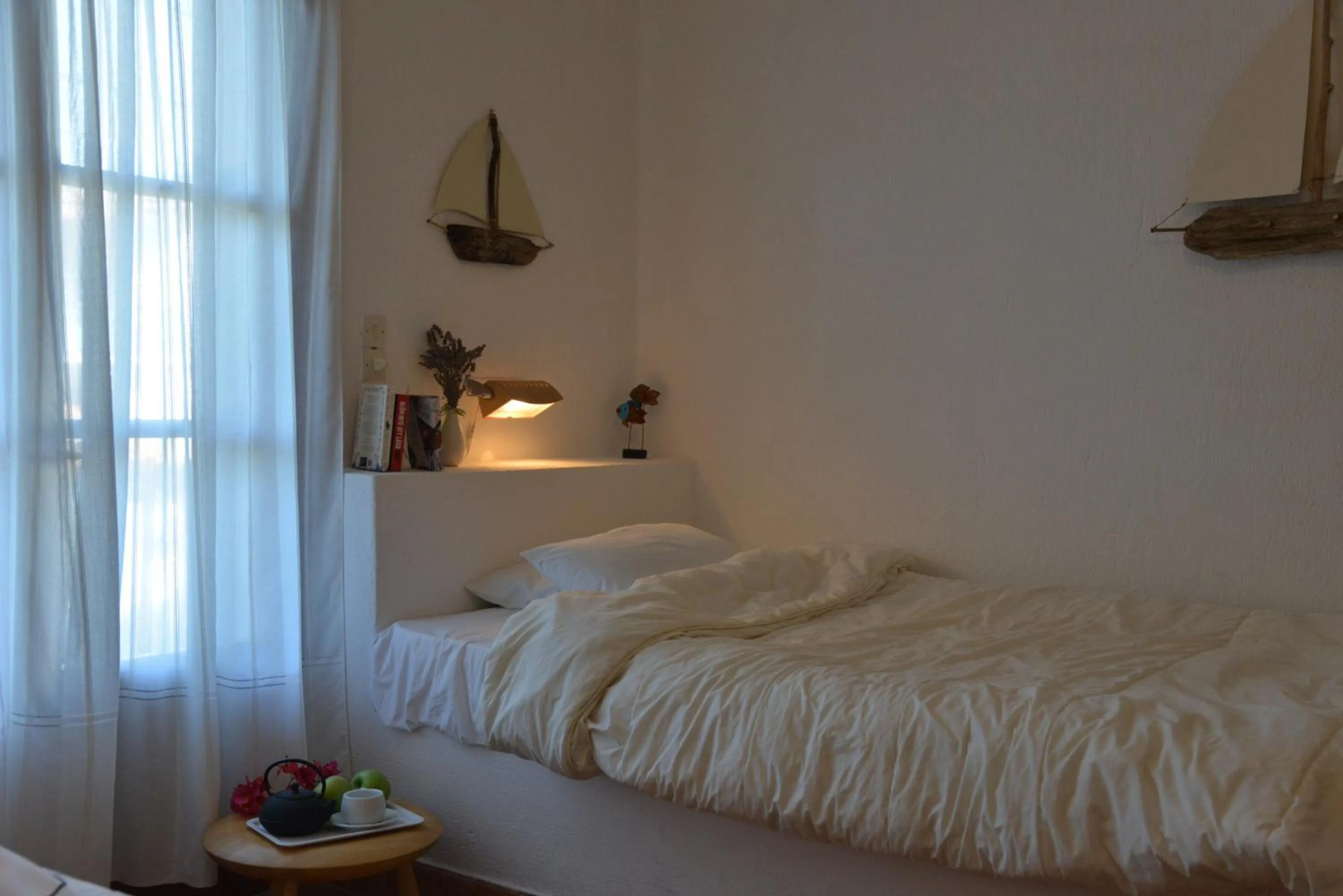 Bed in Anofli Suites