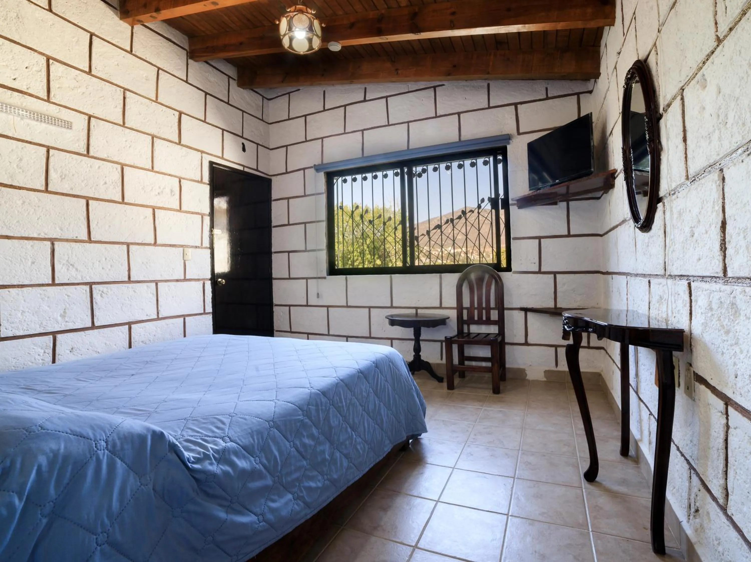 Bed in Hotel Quinta Mirador Zacualli