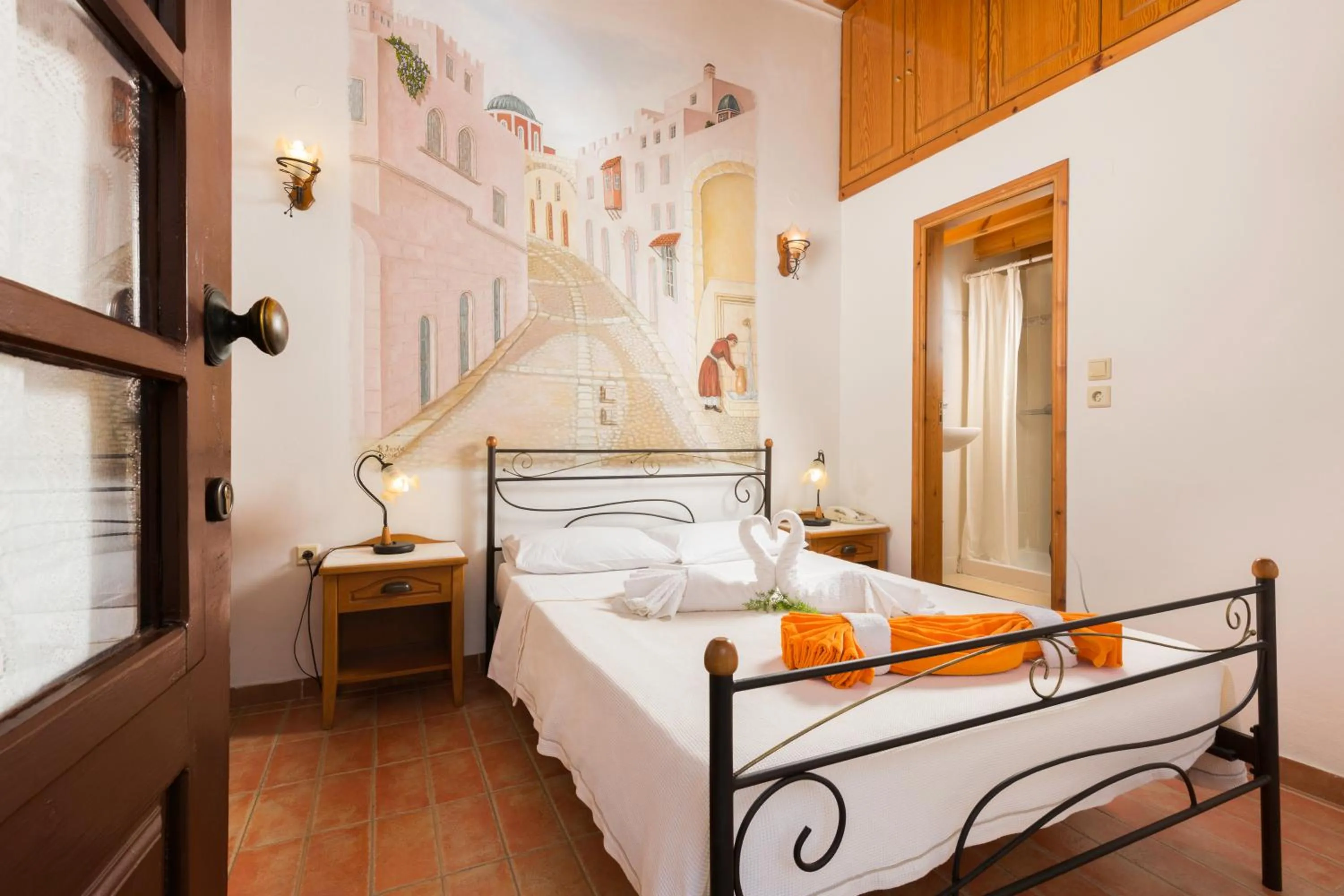 Bed in Camelot Traditional & Classic Hotel