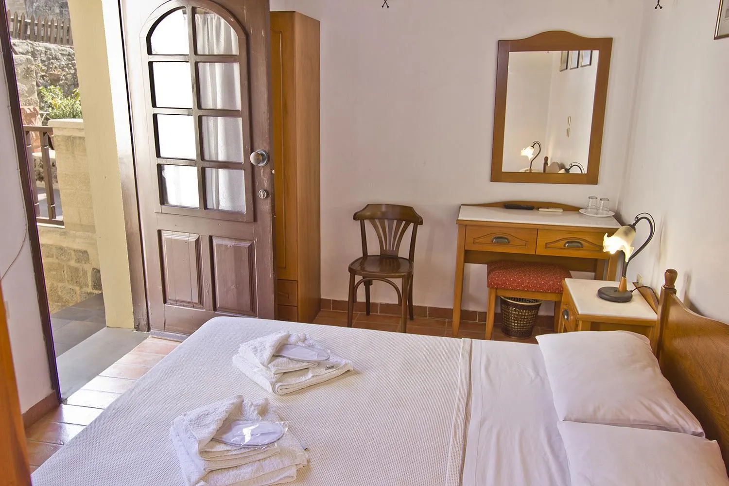 Bed in Camelot Traditional & Classic Hotel