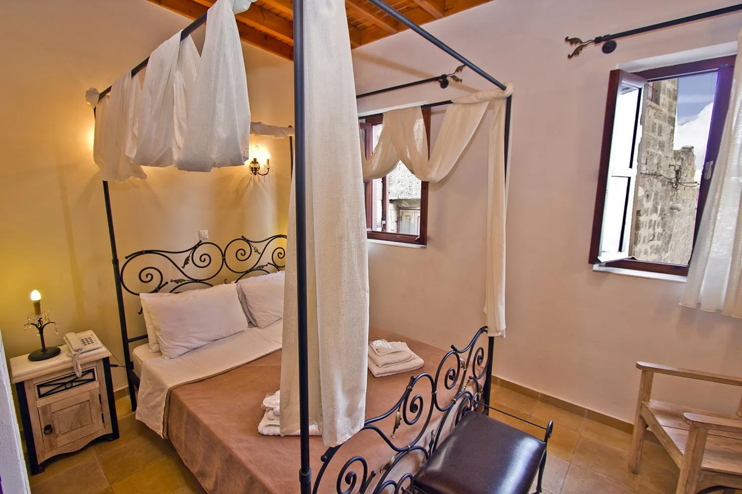 Bed in Camelot Traditional & Classic Hotel