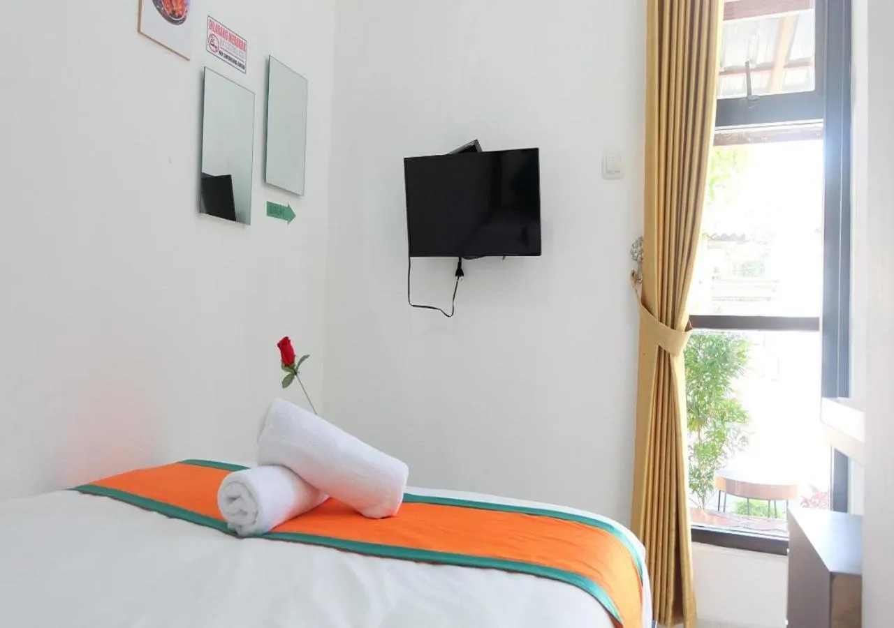 Bed in Hotel Jogja Kili Suci By Simply Homy