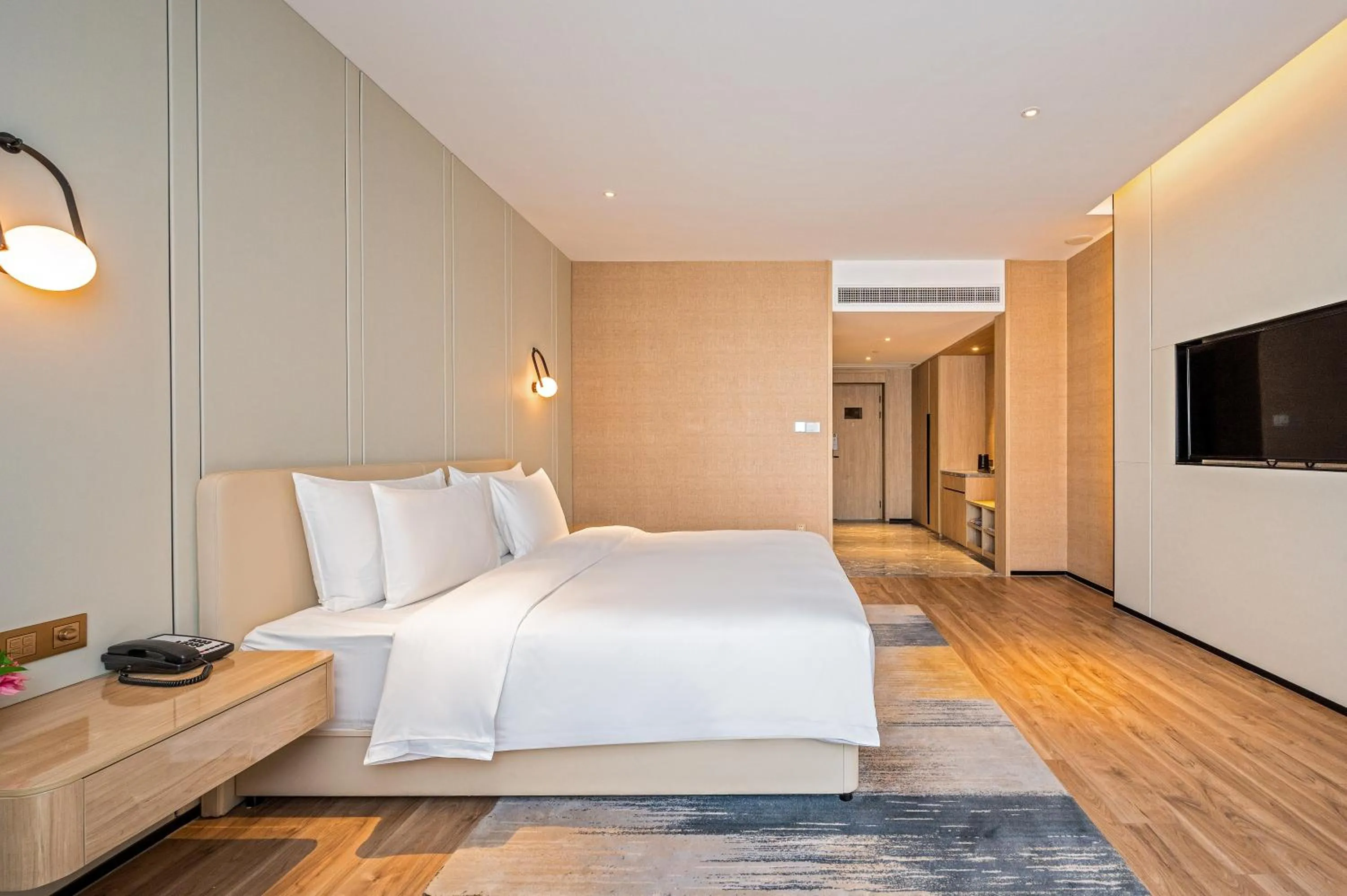 Bed in Nanan Ao Sheng Yi Hao Hotel
