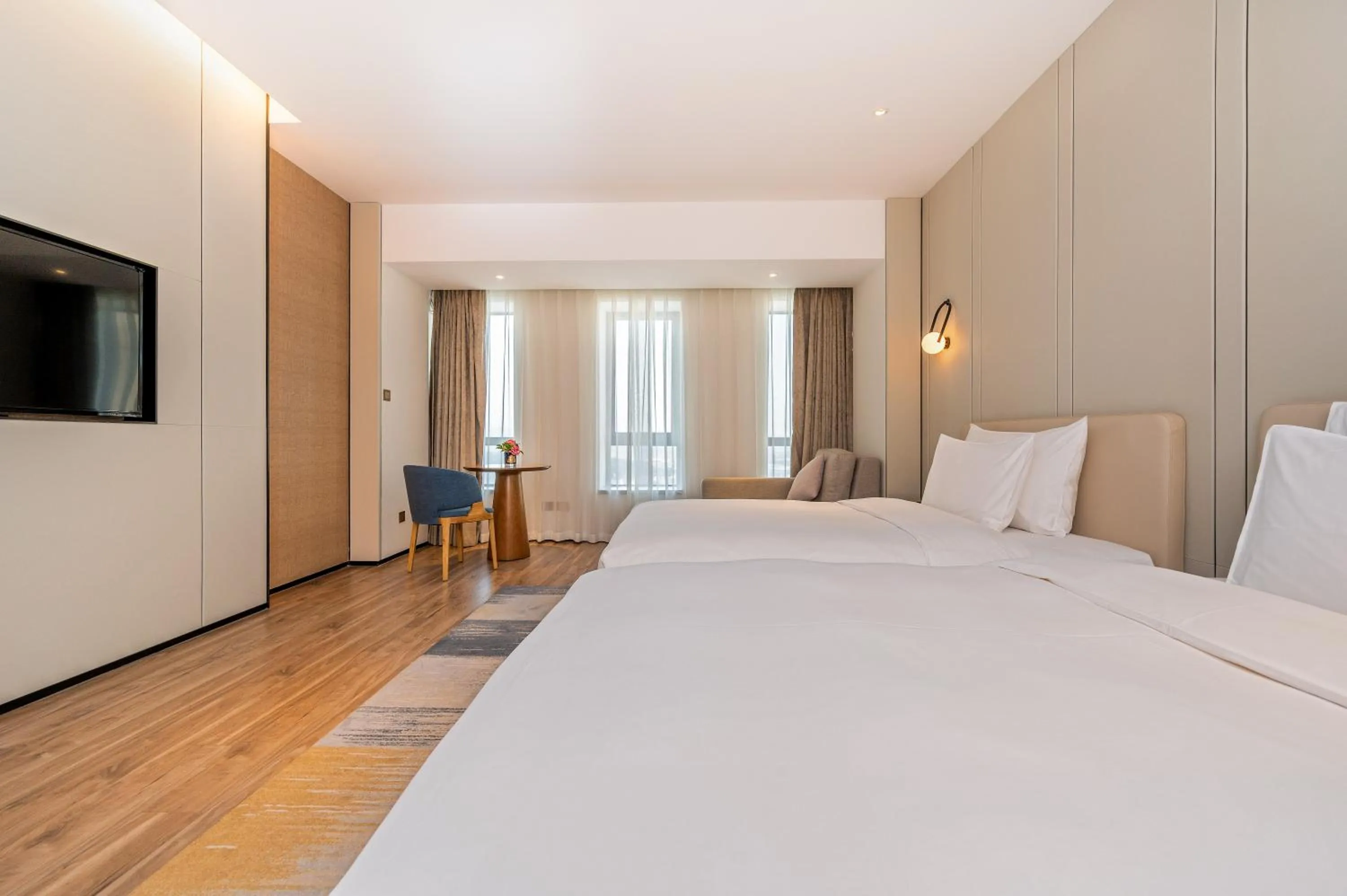 Photo of the whole room, Bed in Nanan Ao Sheng Yi Hao Hotel