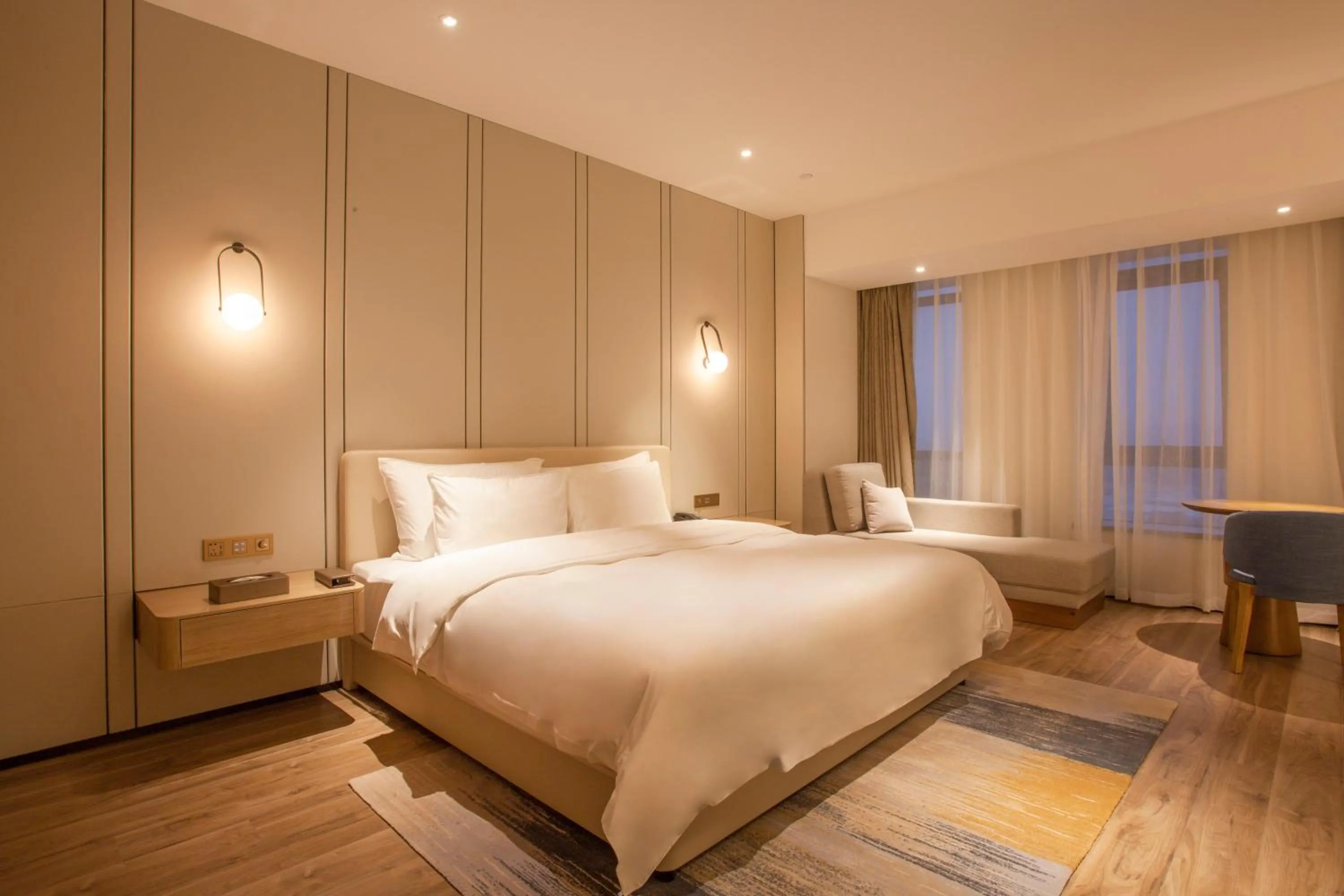Bed in Nanan Ao Sheng Yi Hao Hotel