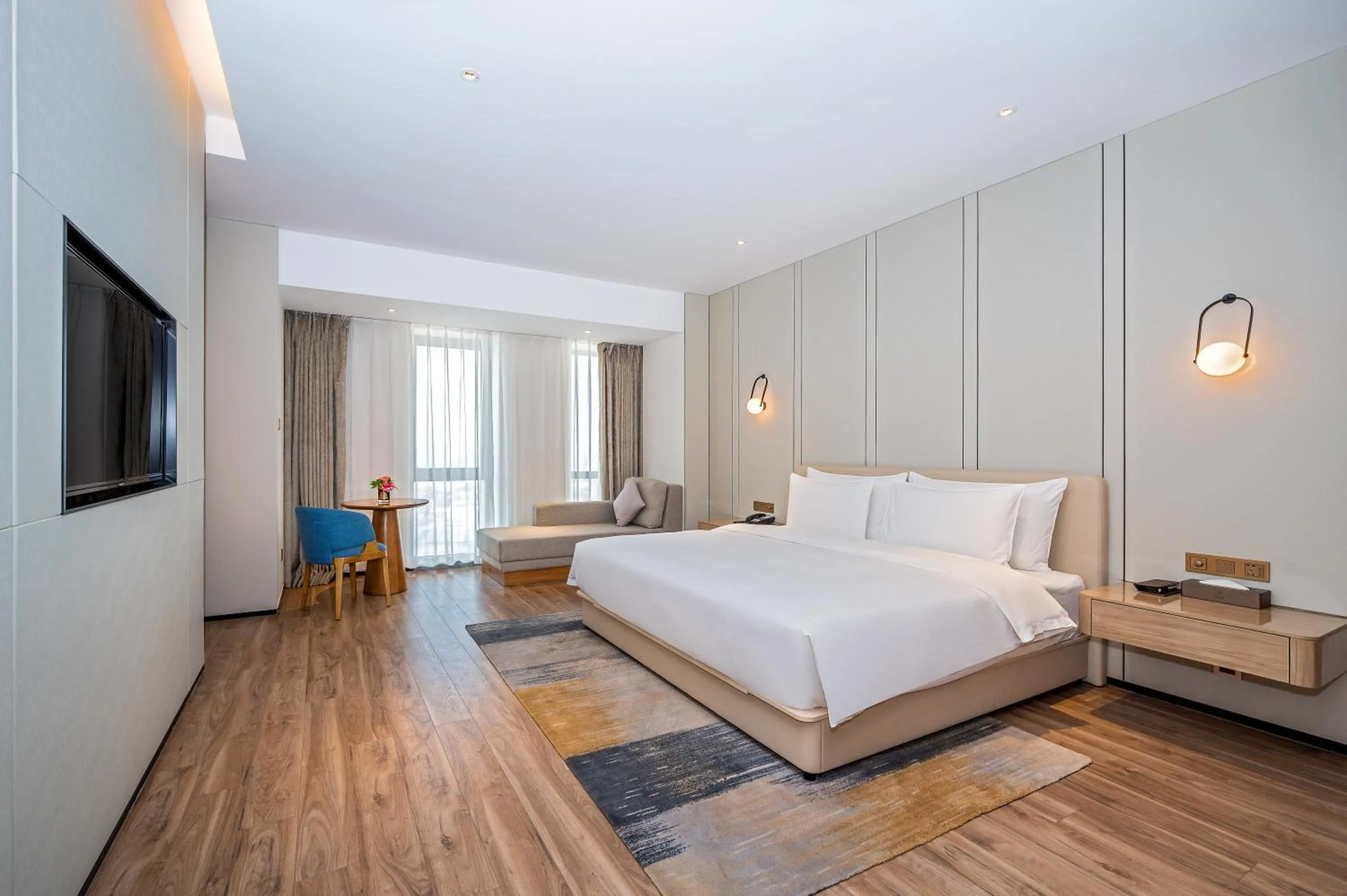 Bed in Nanan Ao Sheng Yi Hao Hotel