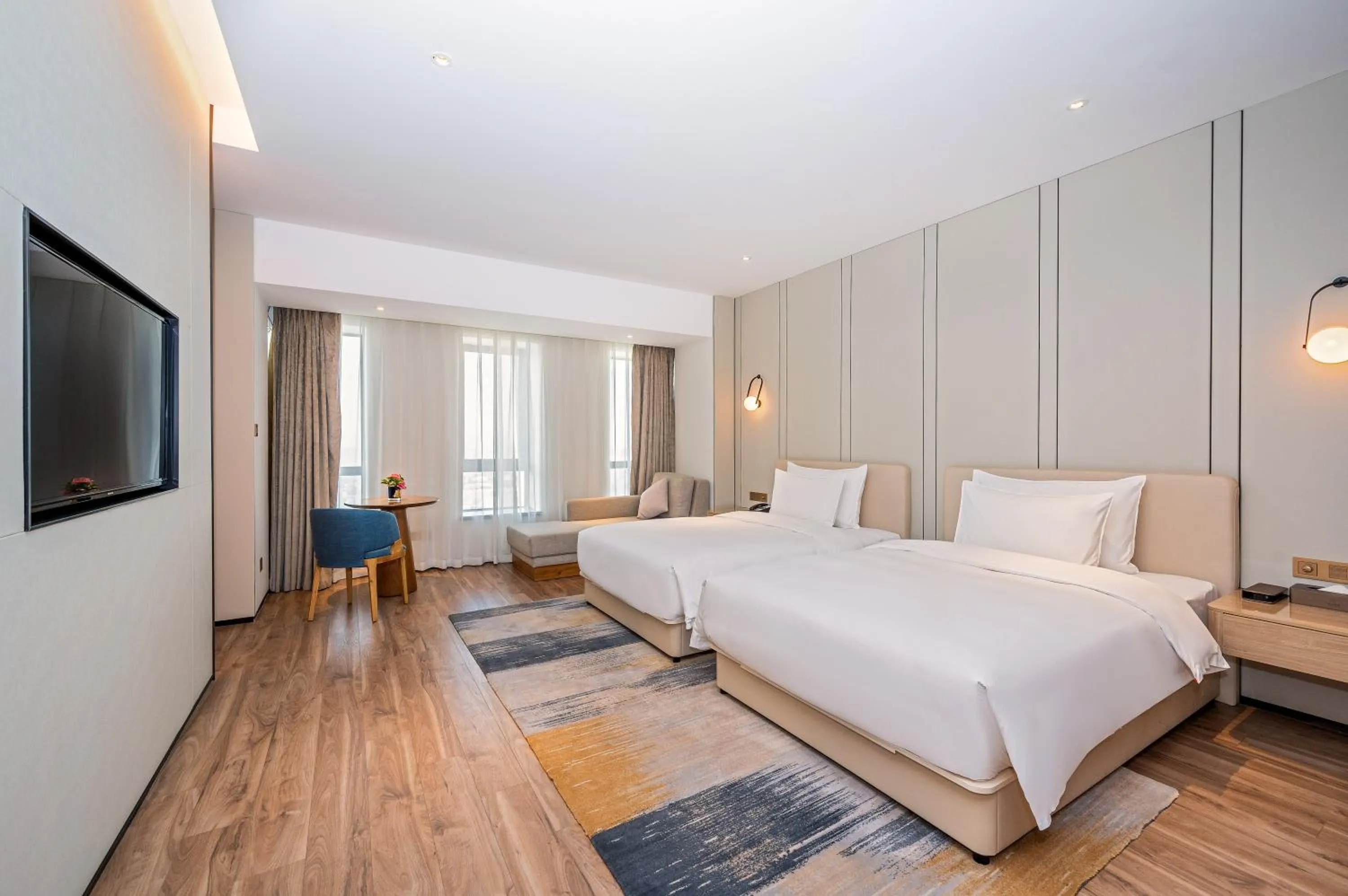 Photo of the whole room, Bed in Nanan Ao Sheng Yi Hao Hotel