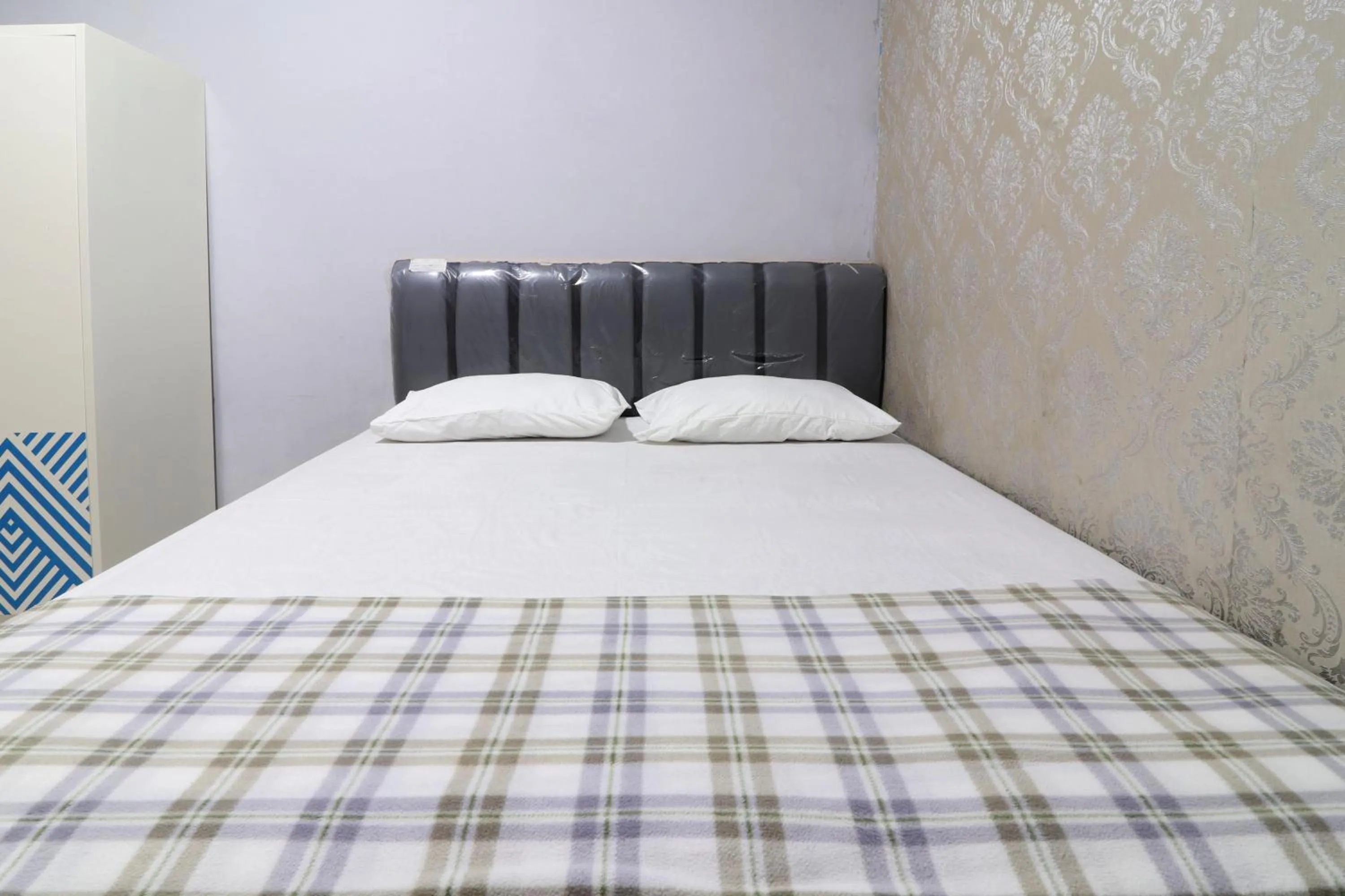 Bed in Ombey Guest House